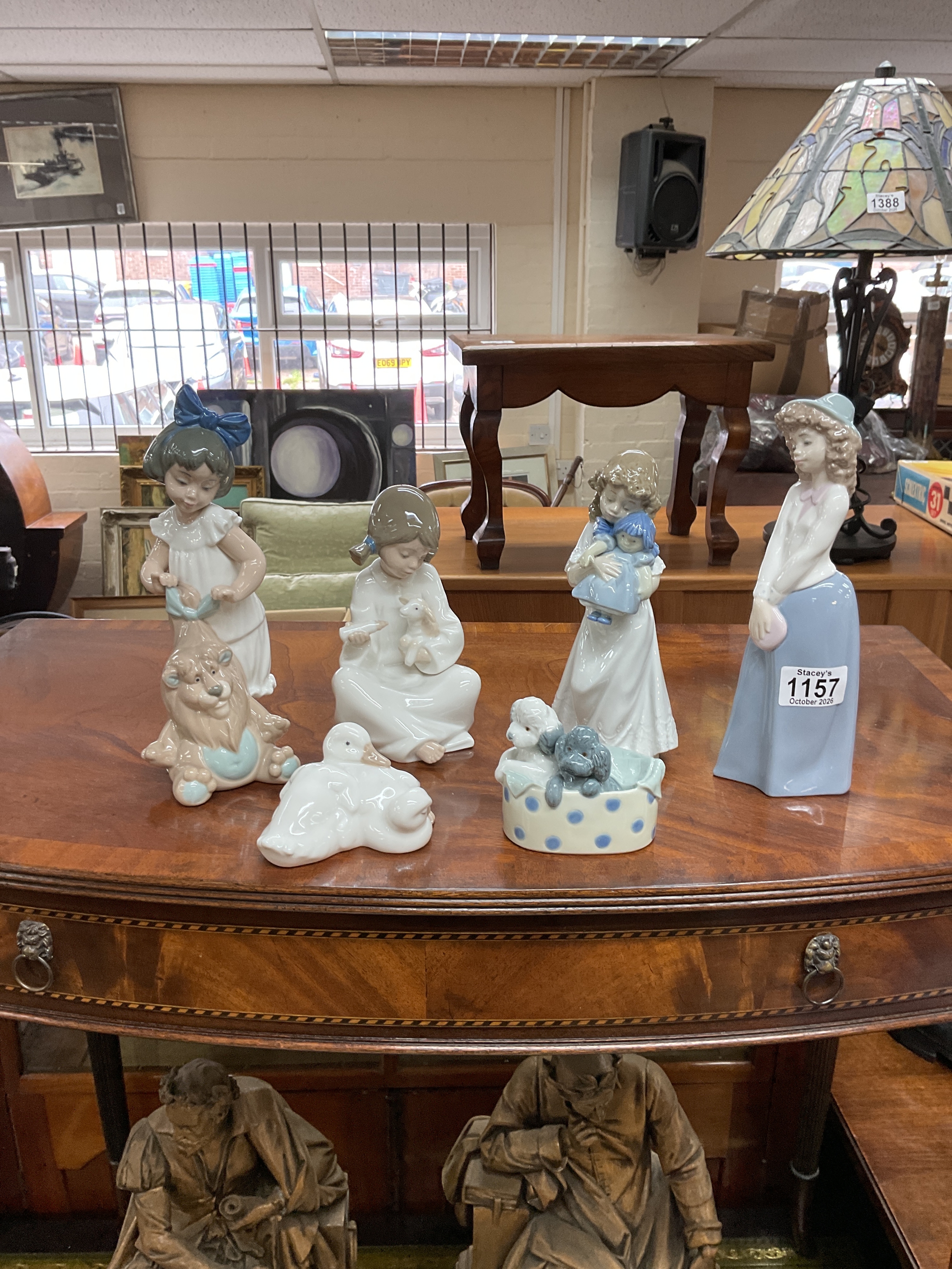 Six NAO figurines.