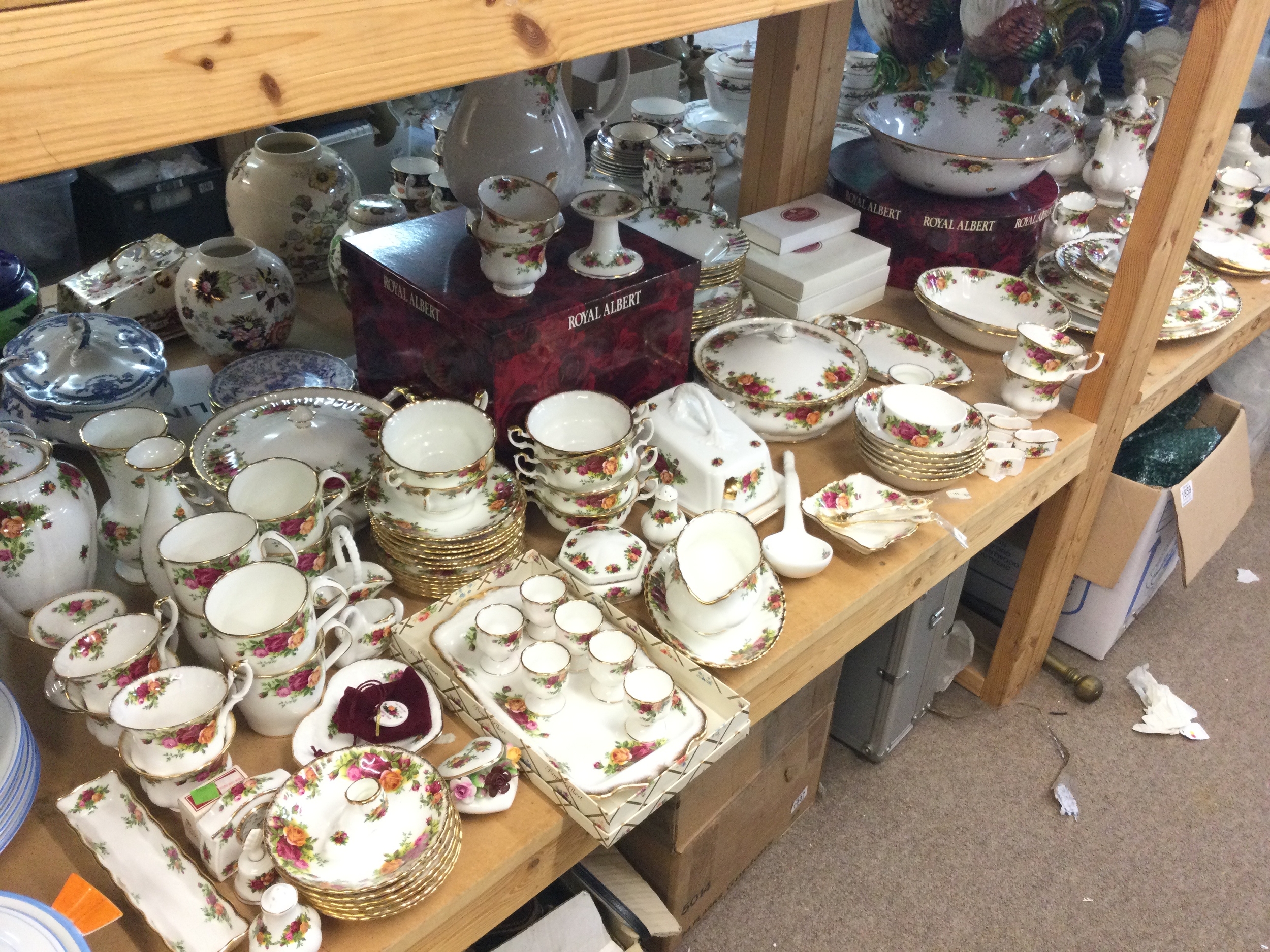 A large Royal Albert country rose set including plates, cups, bowls 