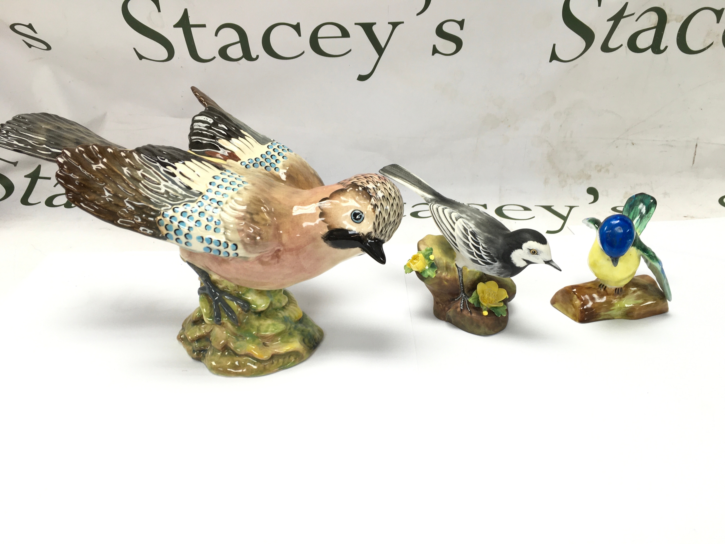 A Beswick Jay Figurine (Model No. 1219) along with two other Crown Staffordshire bird figurine