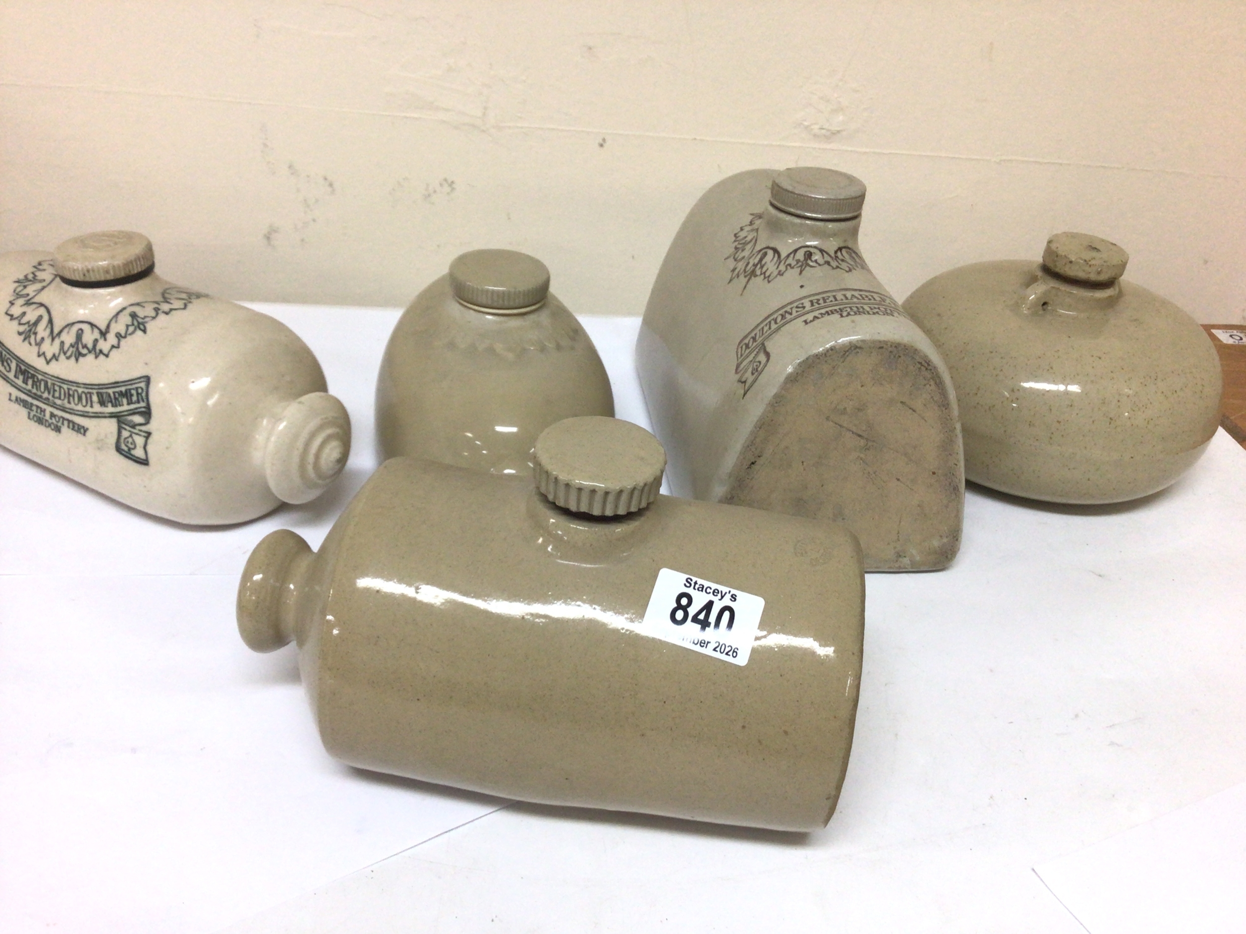 A collection of five Victorian Lambeth Doulton and other bed foot warmers all in good condition with stoppers (5) NO RESERVE