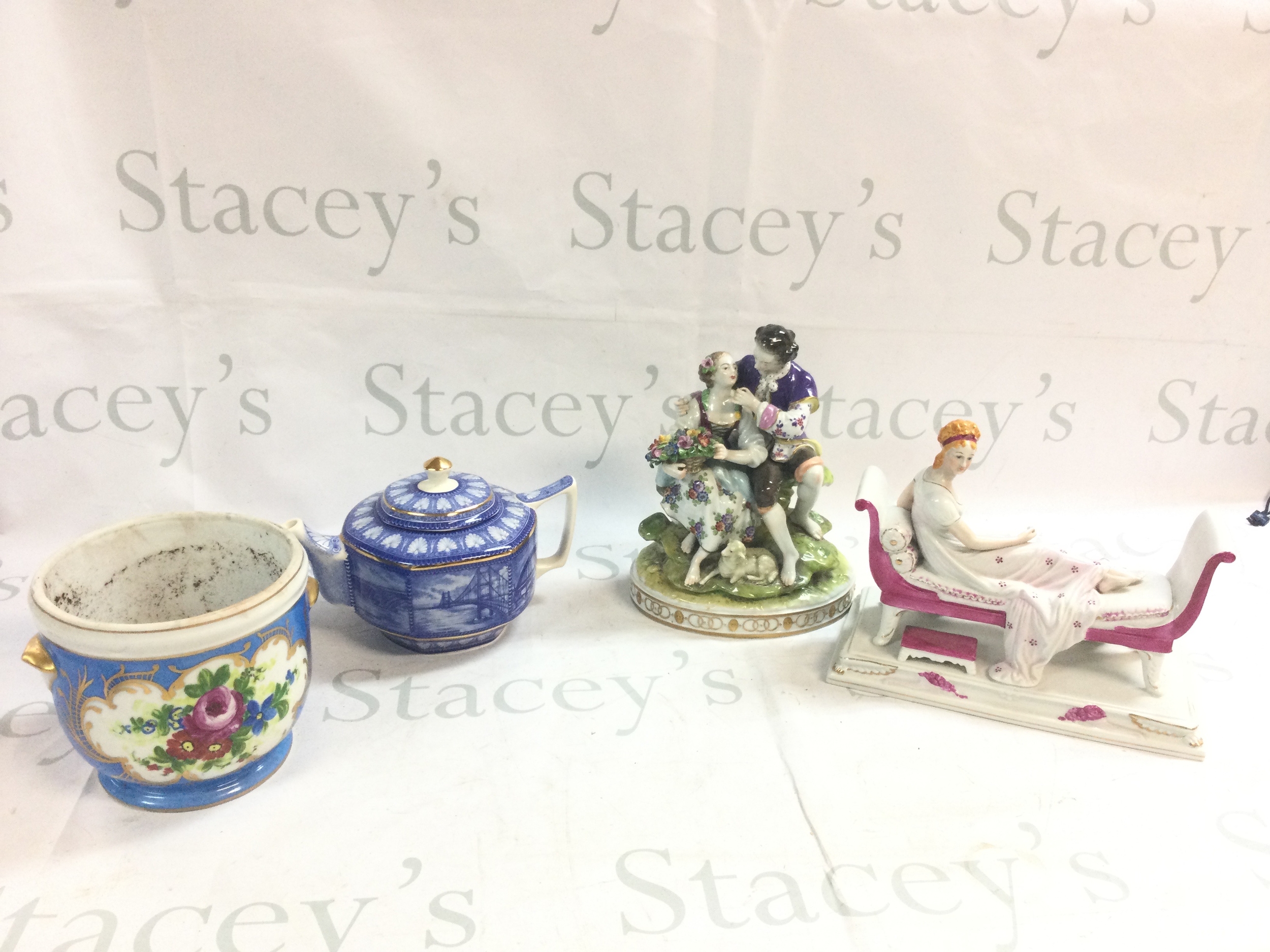 Two Retrospective German figure groups, blue and white teapot and a vase 