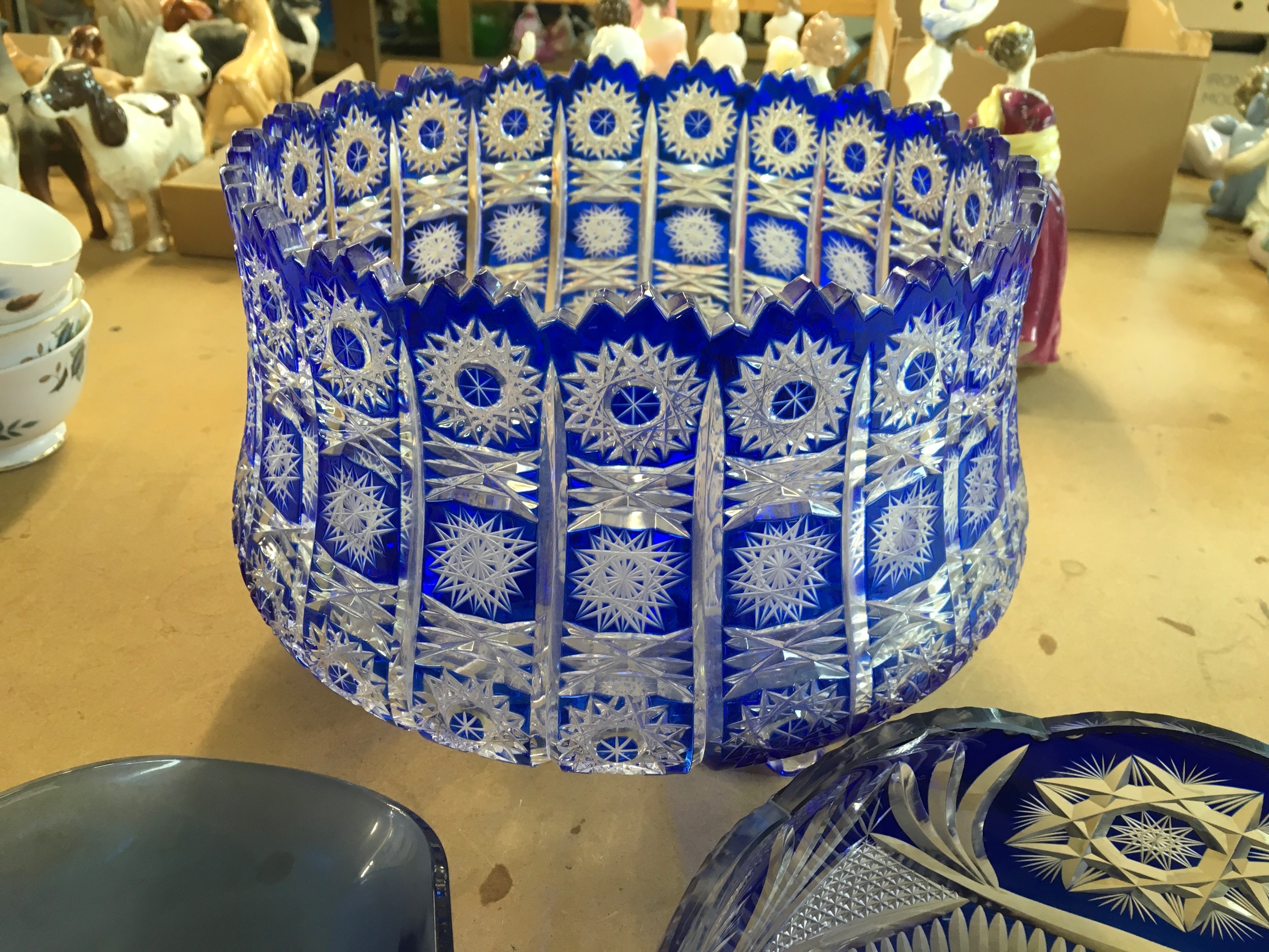 vintage Bohemian blue crystal punch bowl along with two other blue glass items.