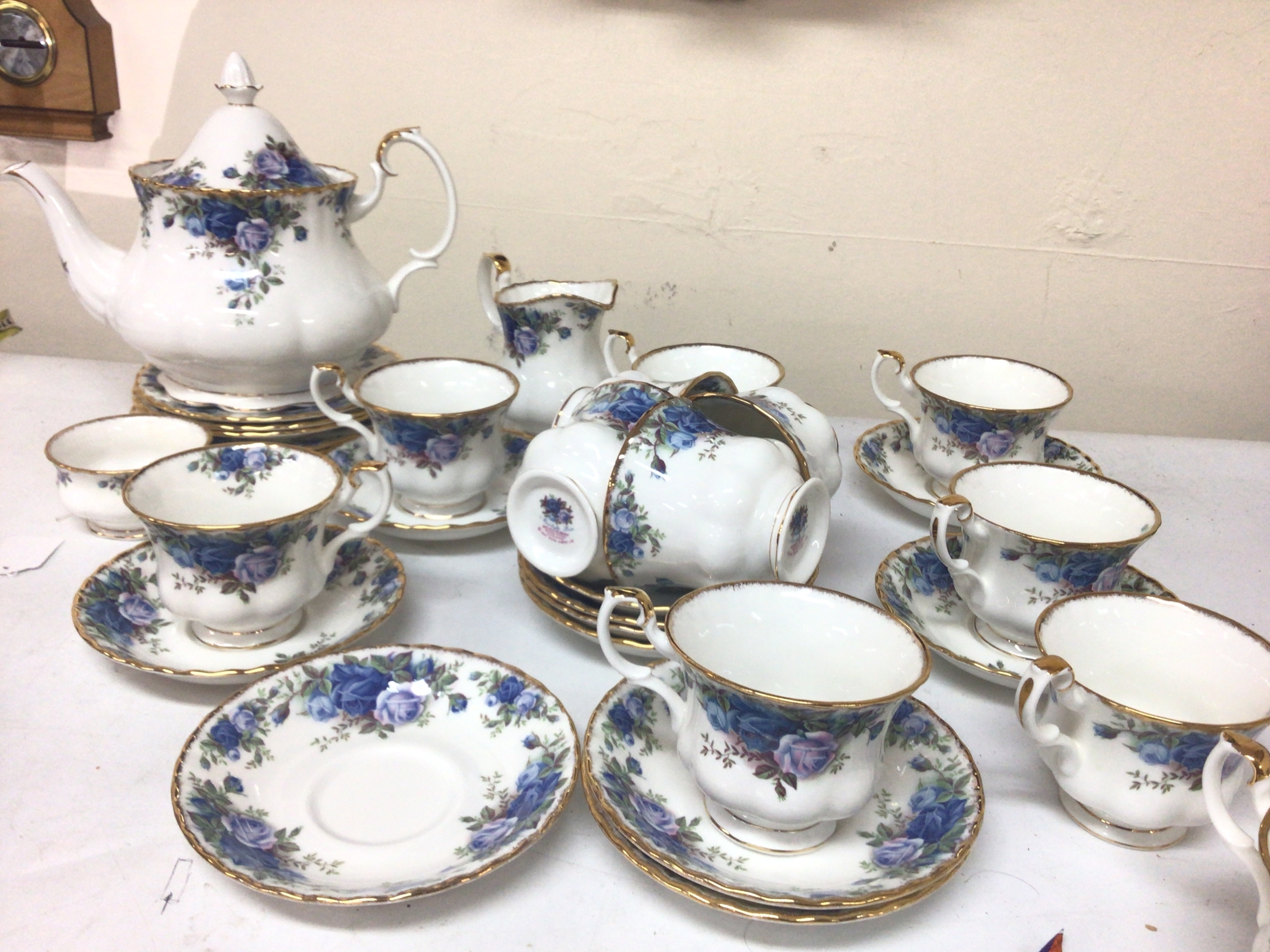  A Royal Albert Moonlight Rose tea set with tea pot twelve place setting. 