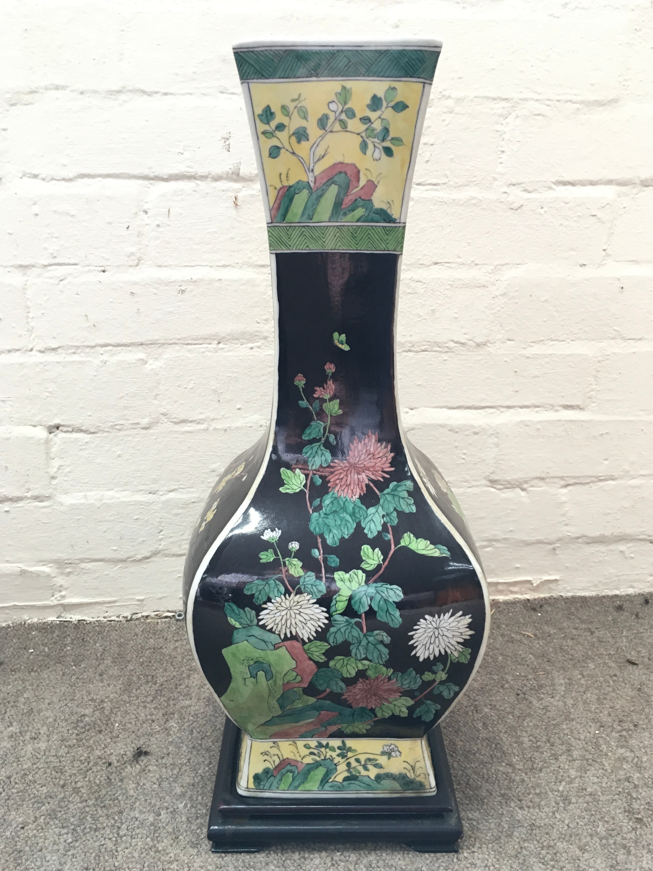 A Chinese porcelain famille noire square-section vase, six character mark at base. 51cm tall