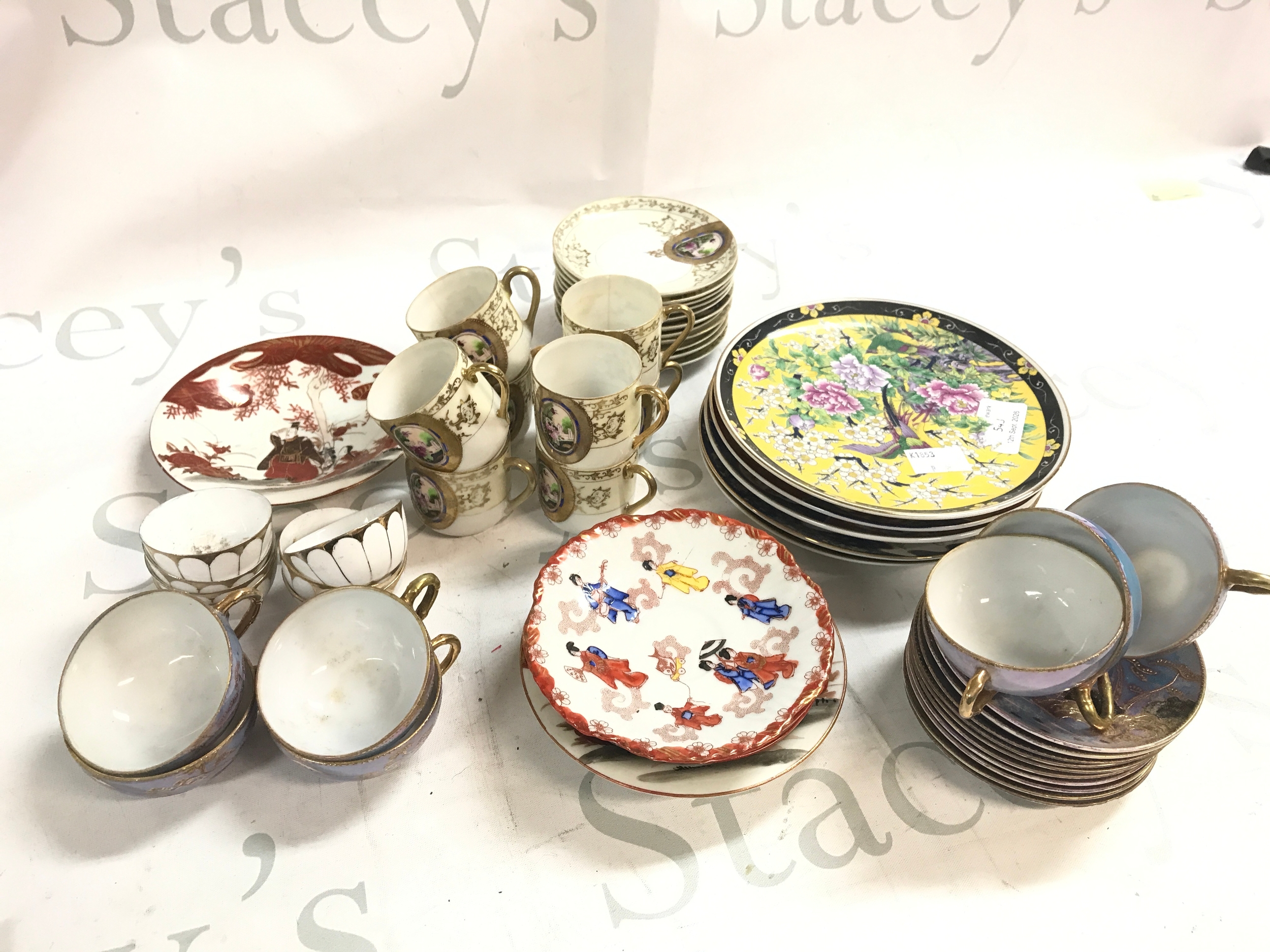 Chinese eggshell porcelain tea sets including cups, saucers, plates etc 