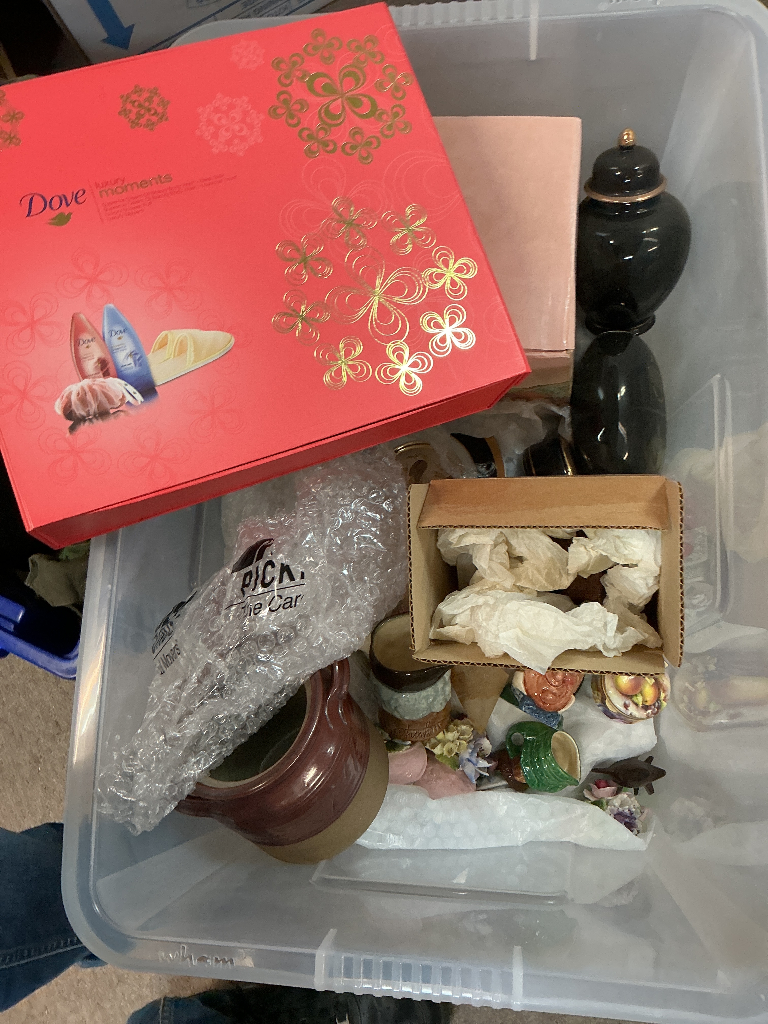 Box containing ceramics David Winter cottages, Royal Doulton miniature character jugs etc