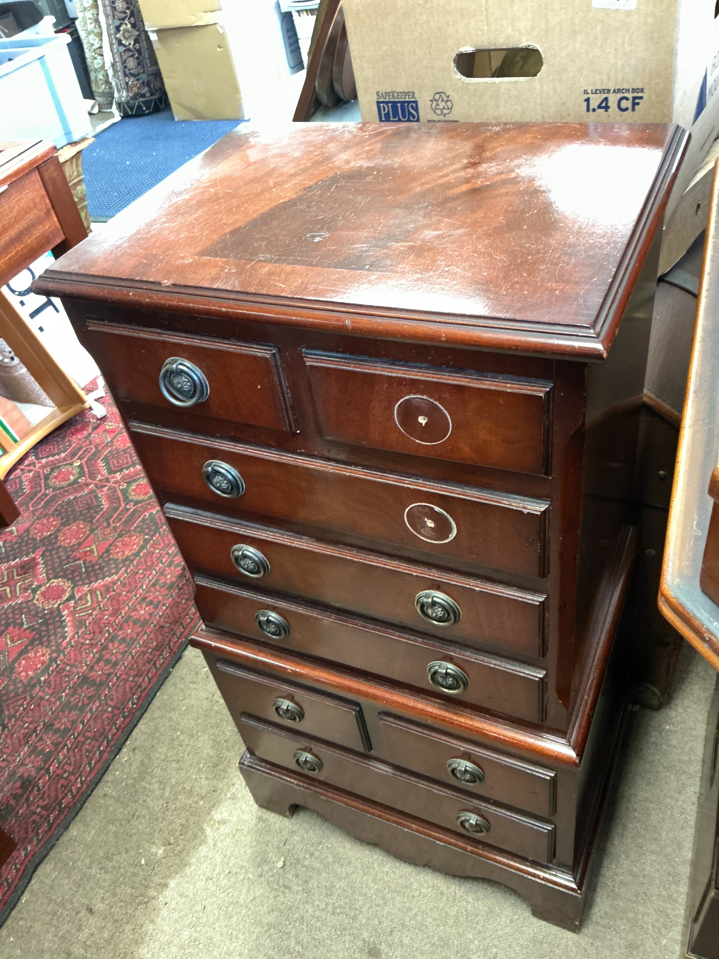A small mahogany chest of drawers, approx height 82.5cm.