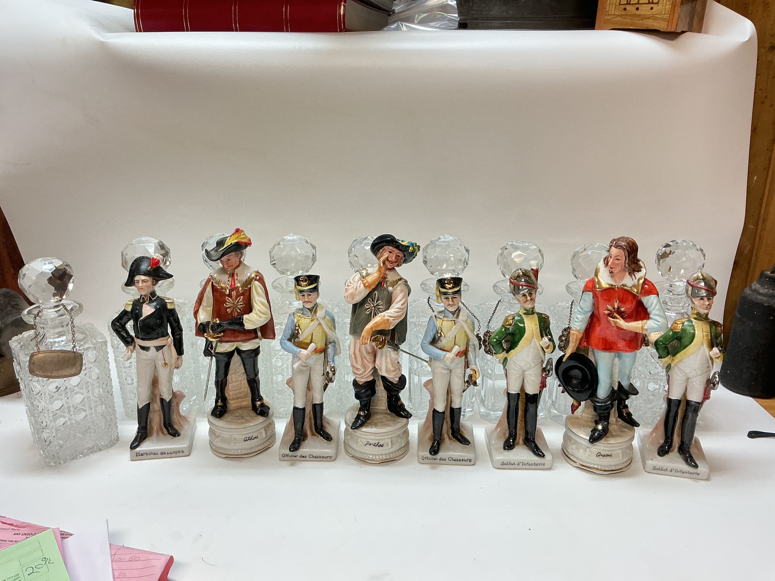 Collection of retrospective copy soldier figures and cut glass decanters.