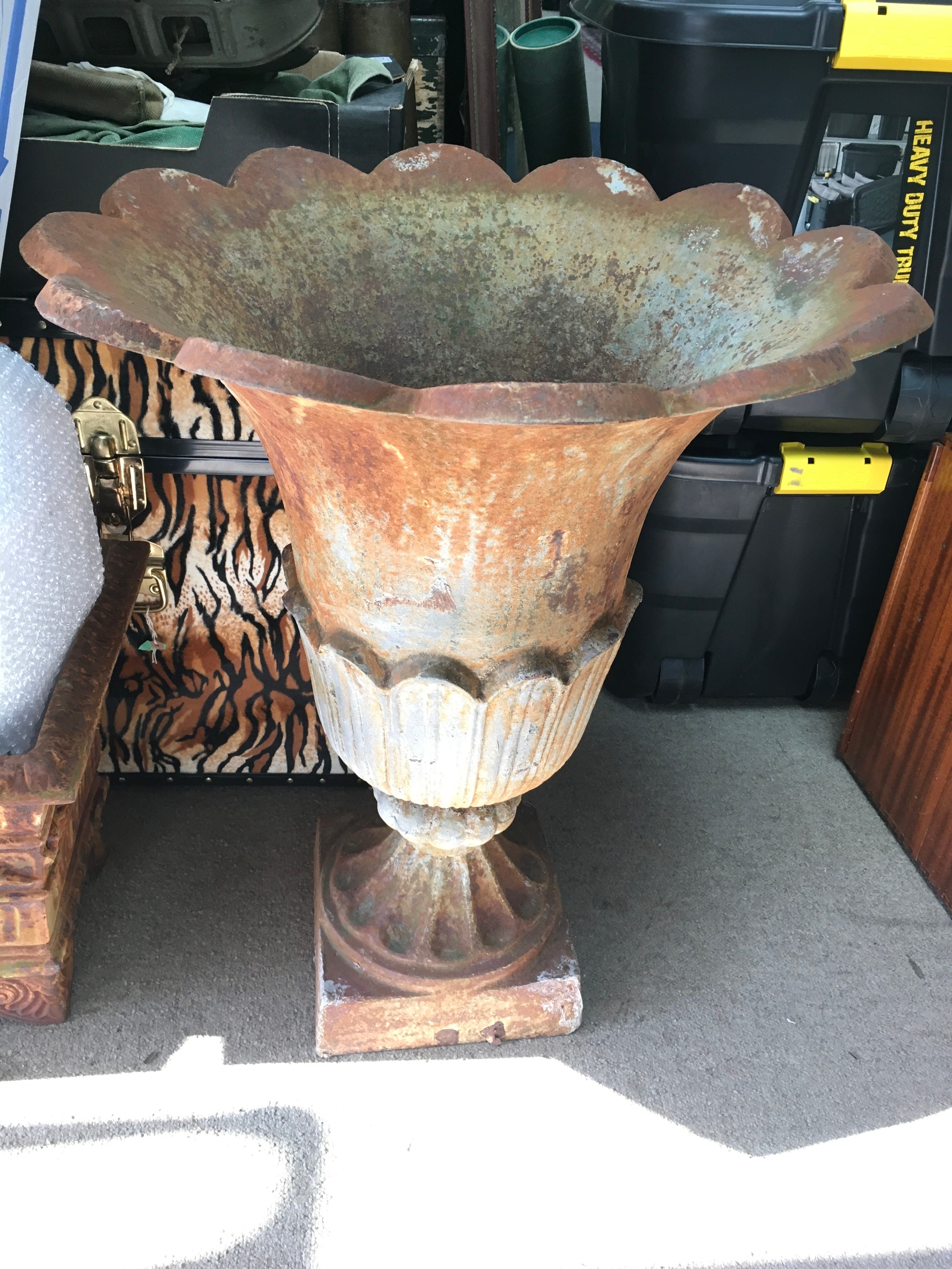 An 18th century retrospective style cast iron urn. Approx W59 x L73cm