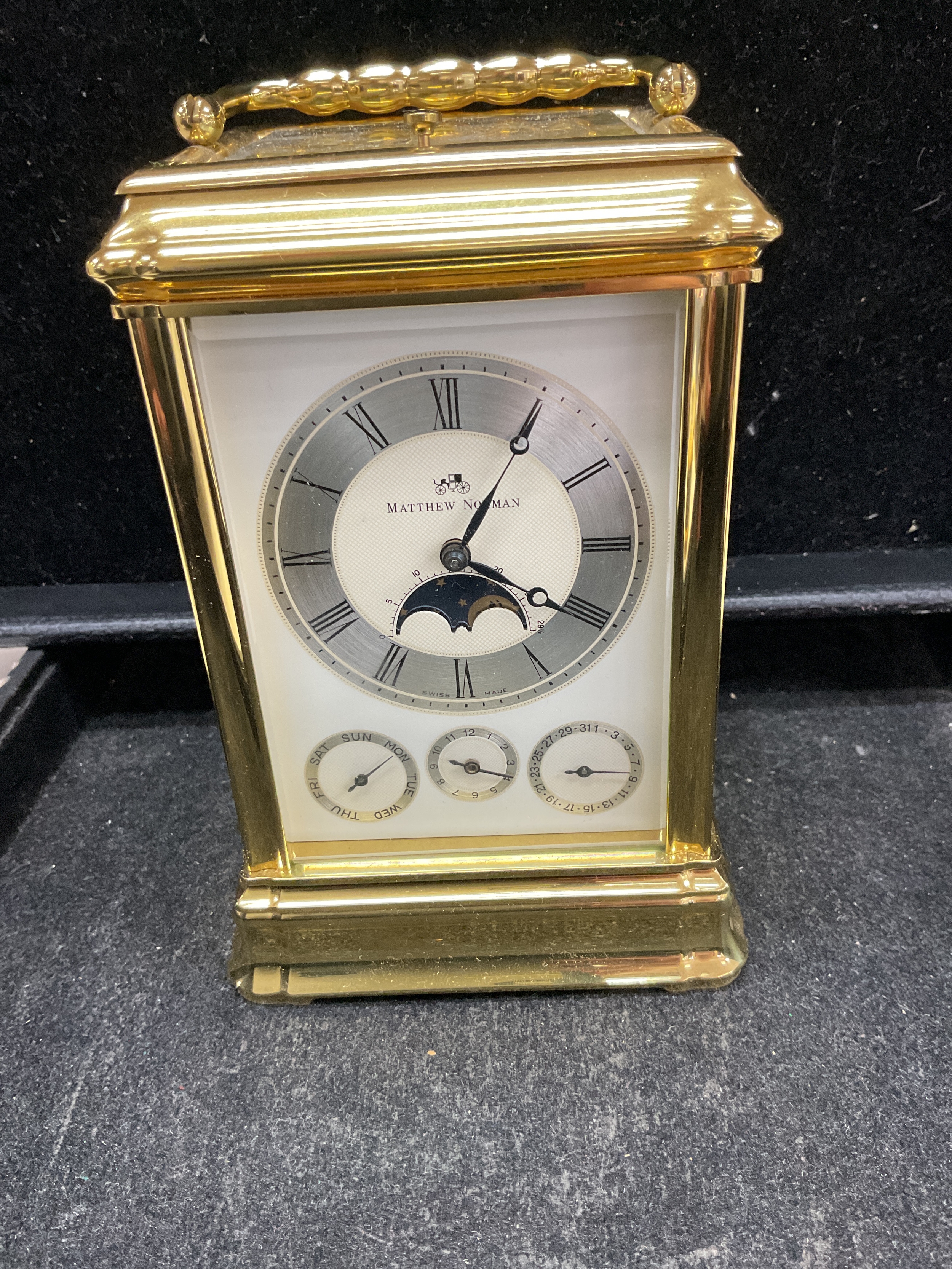 Matthew Norman complication moon phase carriage clock 1751/81, calendar date with three adjusters to the base, marked to the back and striking on gong.H 15 cm x W9.5 cm x D9 cm.