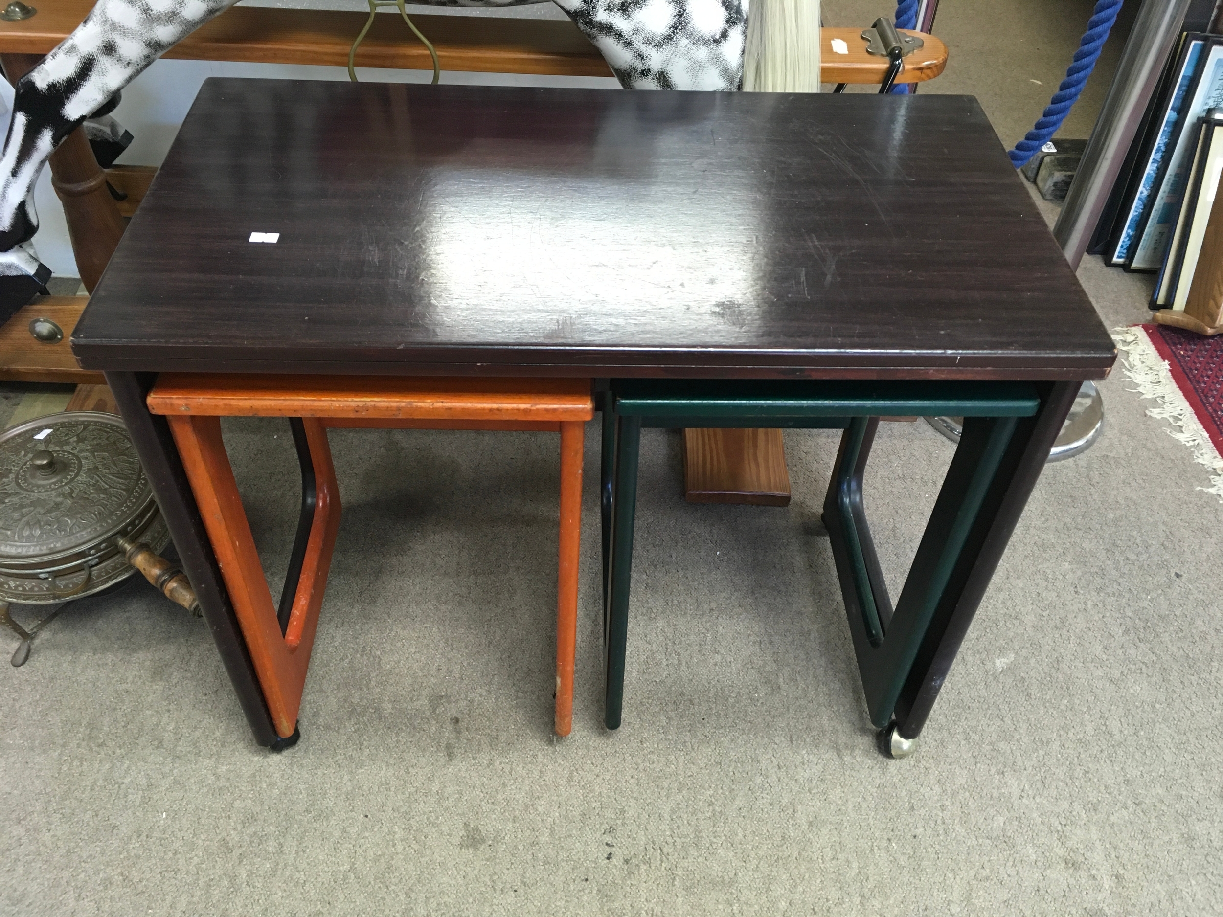A nest of modern tables. 
largest being 66cm by 40cm
