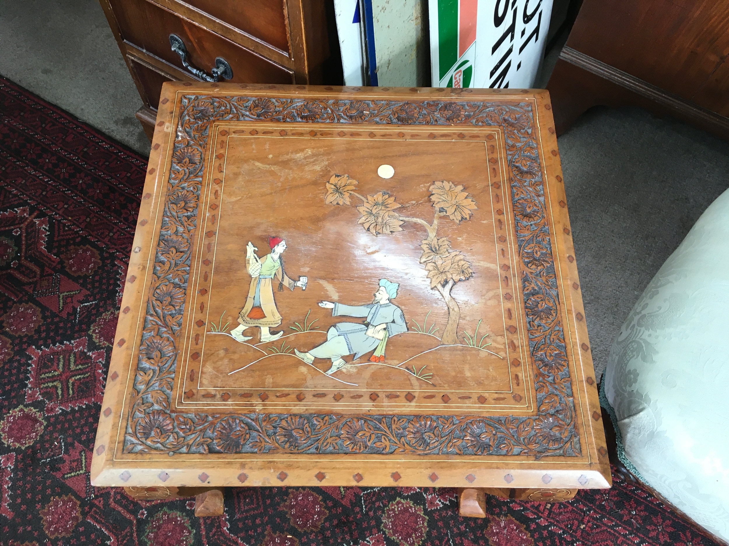 vintage hand inlaid wooden marquetry table depicting a traditional Persian or Mughal scene. 46cm wide by 45cm tall.