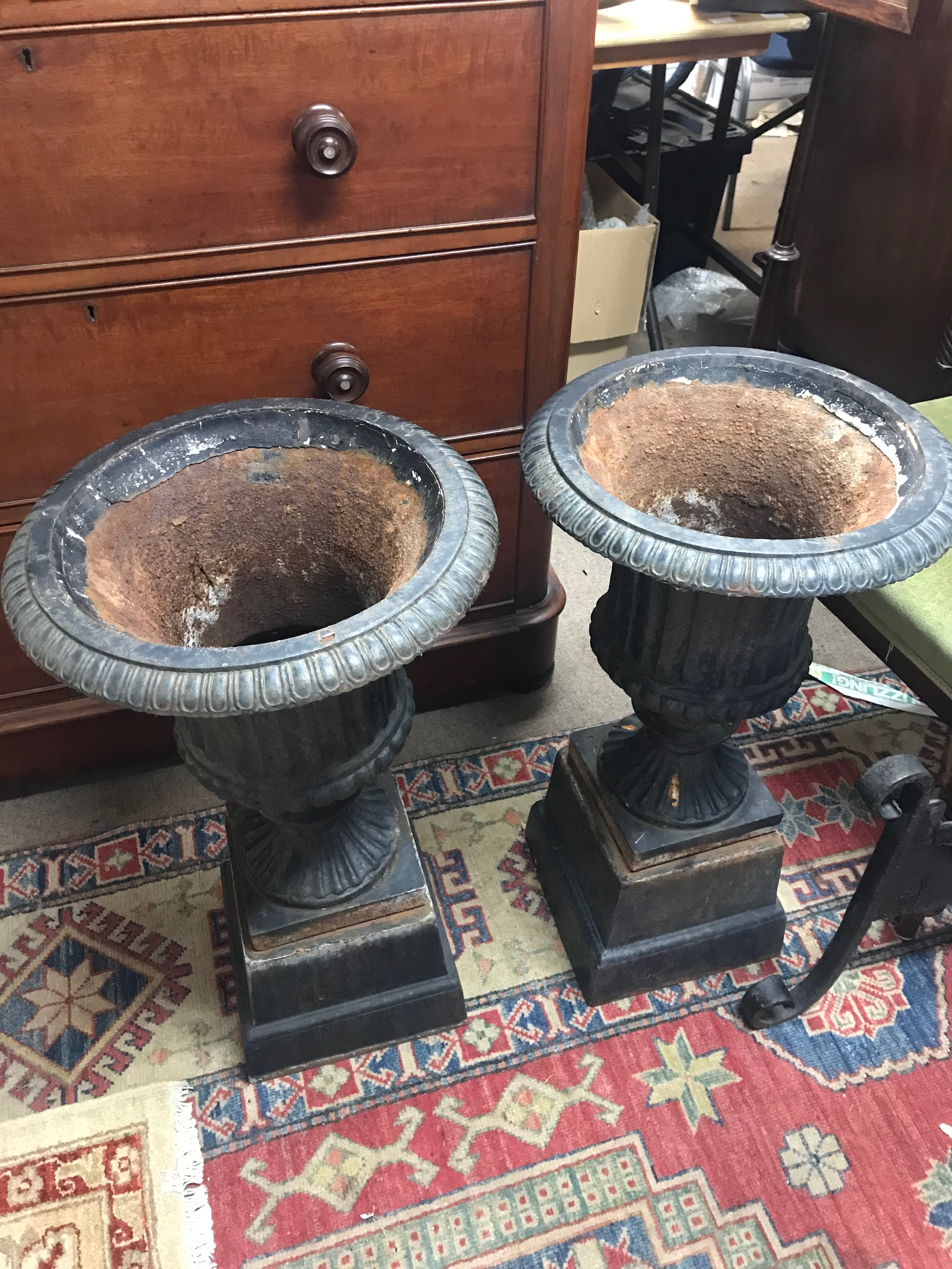 Two garden urns. 38cm wide, 68cm tall