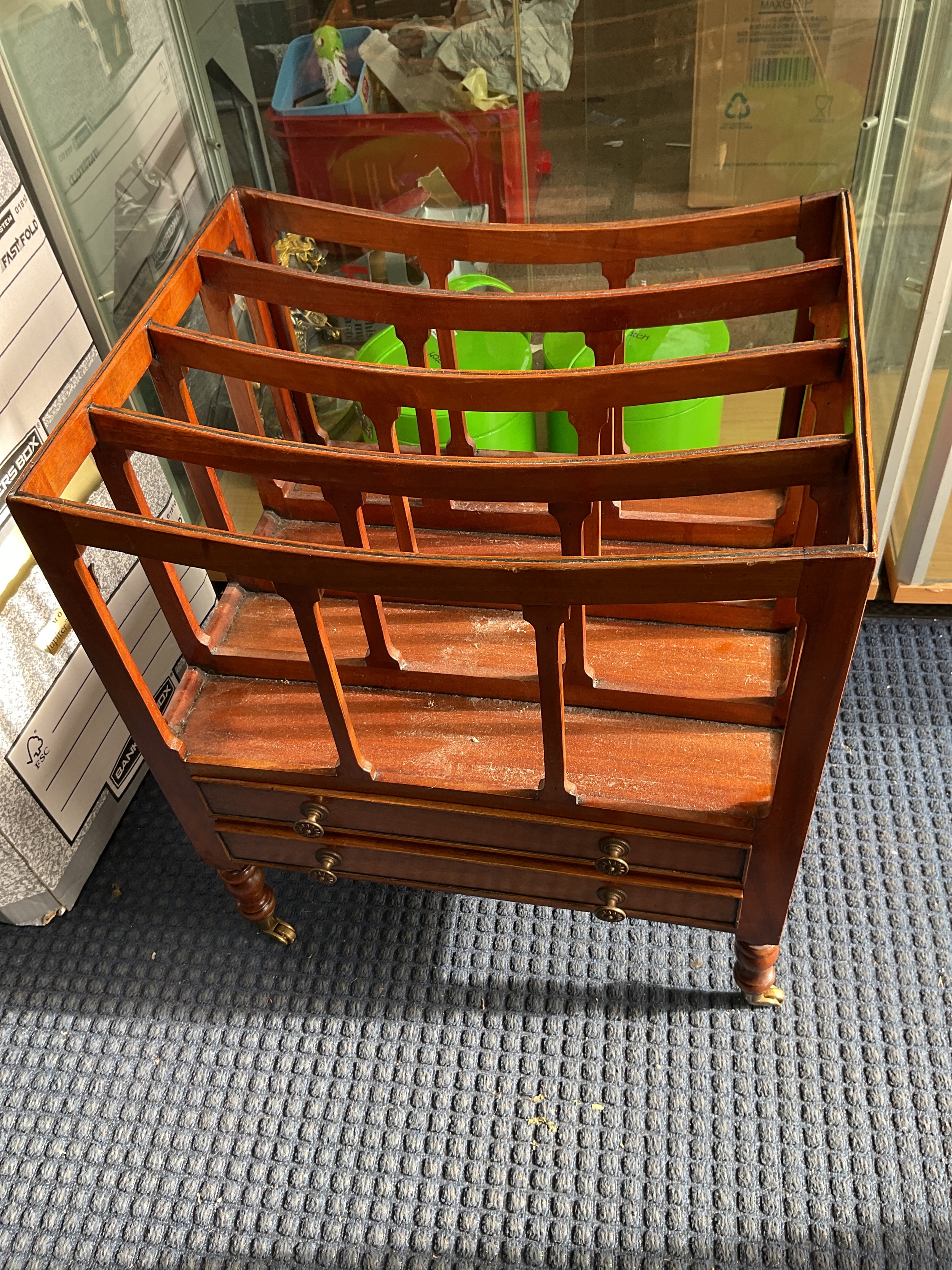 Mahogany Canterbury on brass coaster feet.