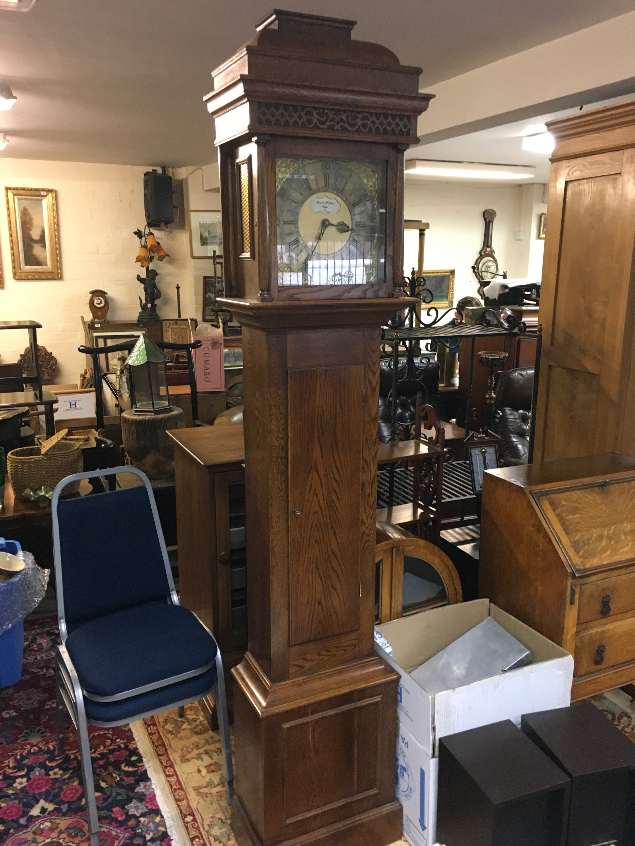 A 20th century long case clock Hutt & Holland, 200cm tall approximately