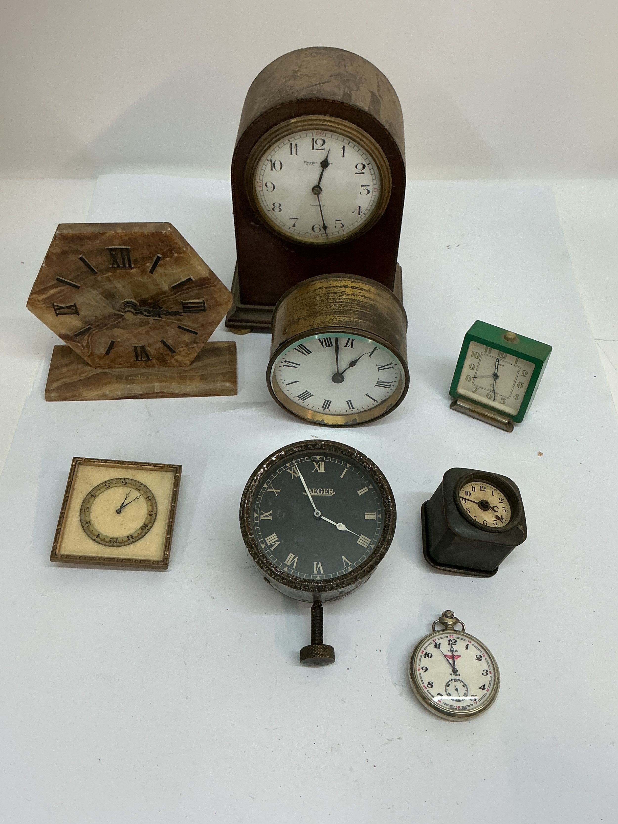 A Mappin & Webb wooden cased mantle clock plus other Art Deco examples and another by Jaeger. Offered for spares or repair  