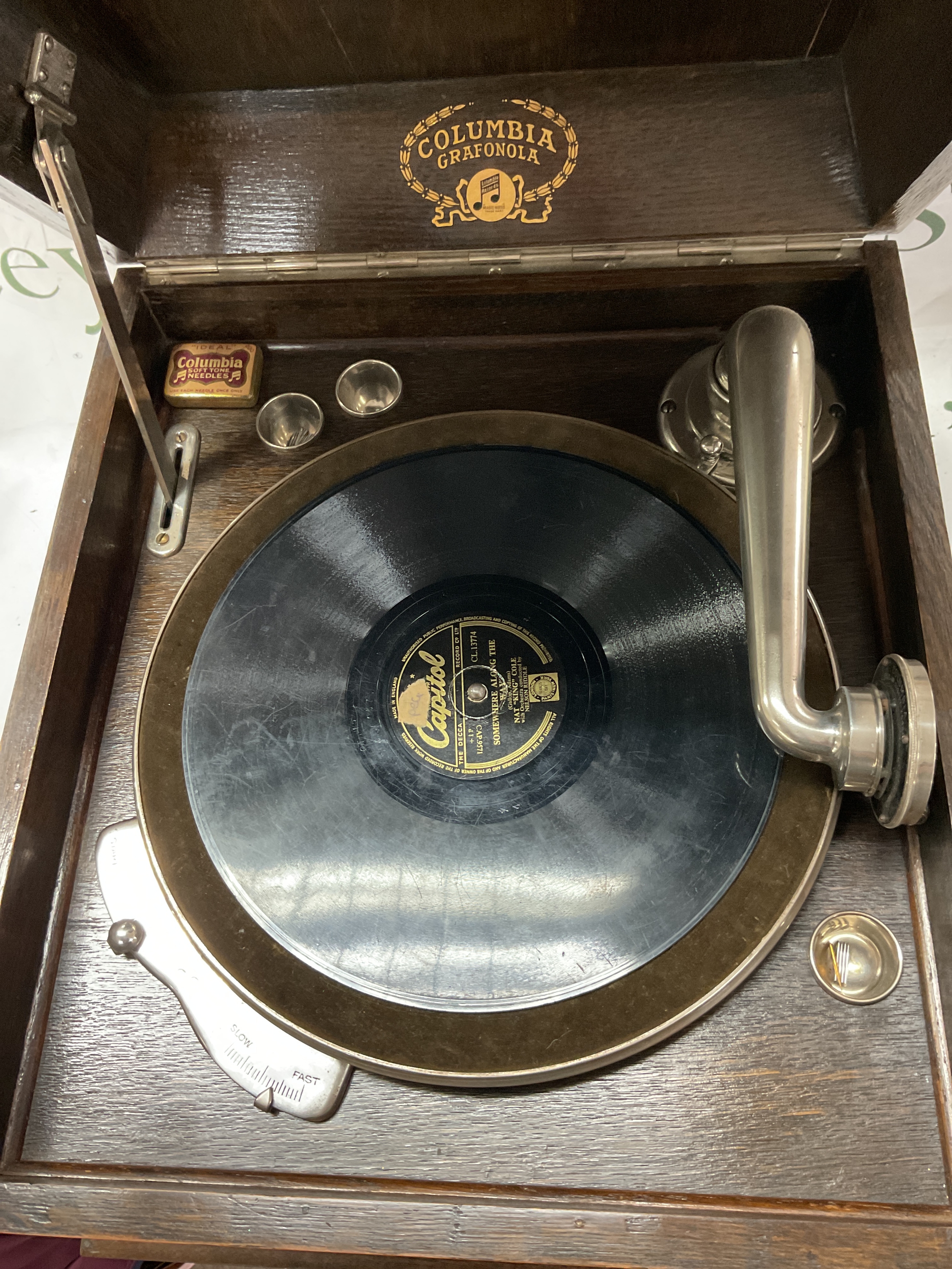 Columbia Grafonola gramophone. In oak case with opening shutters to the front for volume control,in good working order complete with records and pins in Columbia tin. NO RESERVE
