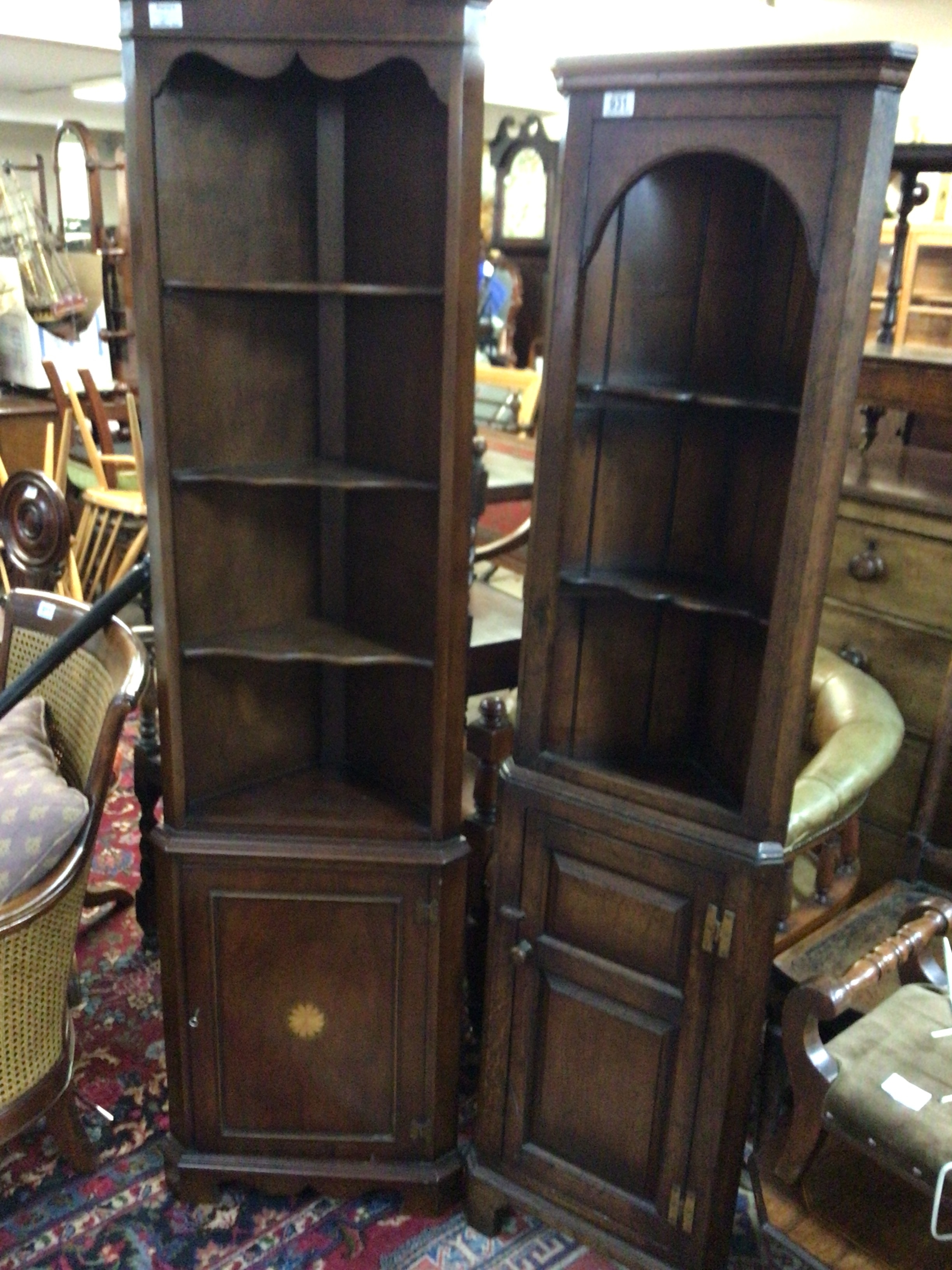 A petite oak corner unit with open shelves above a panel cupboard and a Mahogany corner unit. (2) NO RESERVE