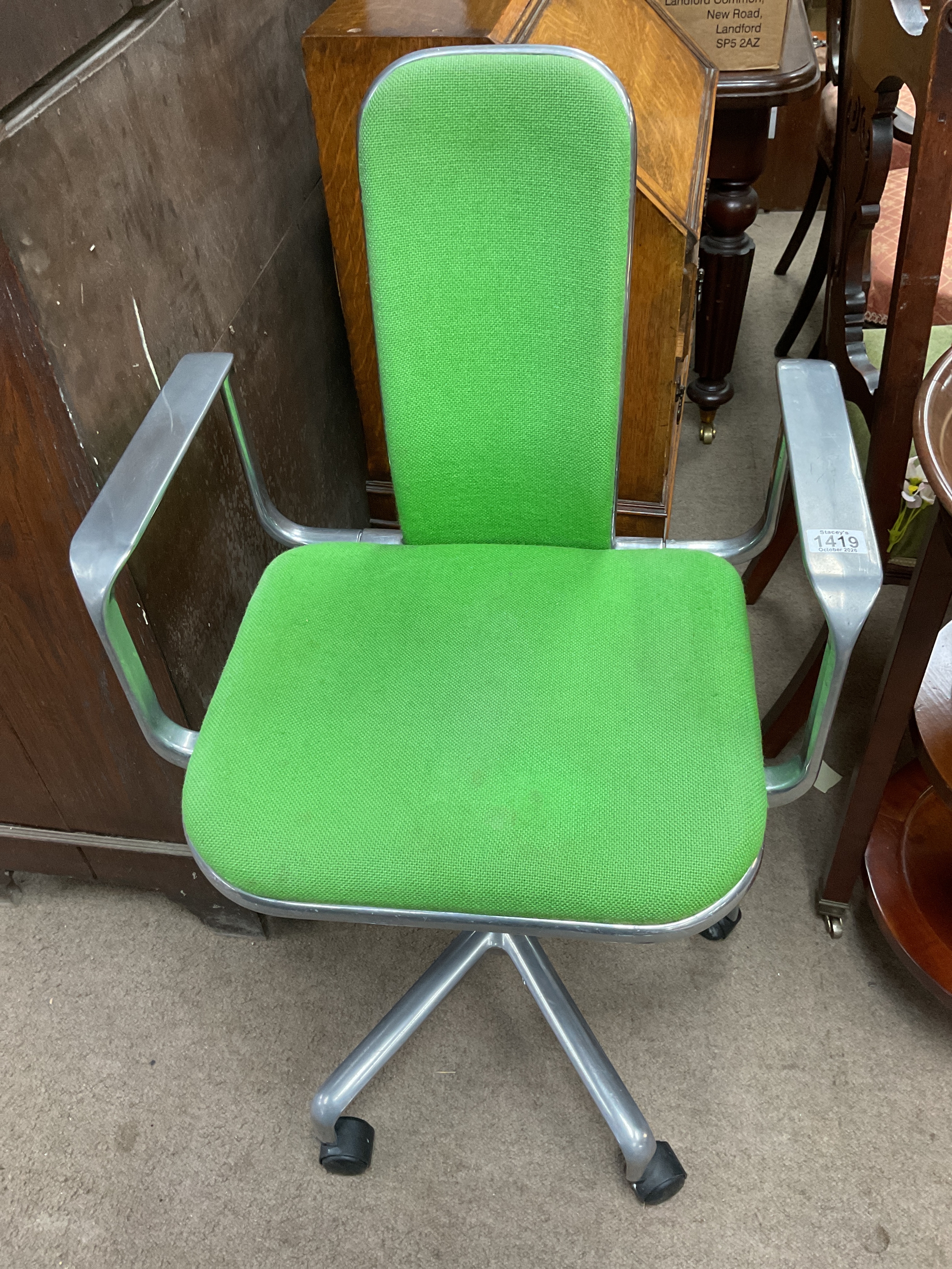 Retro 1970s Fred Scott aluminium swivel chair.