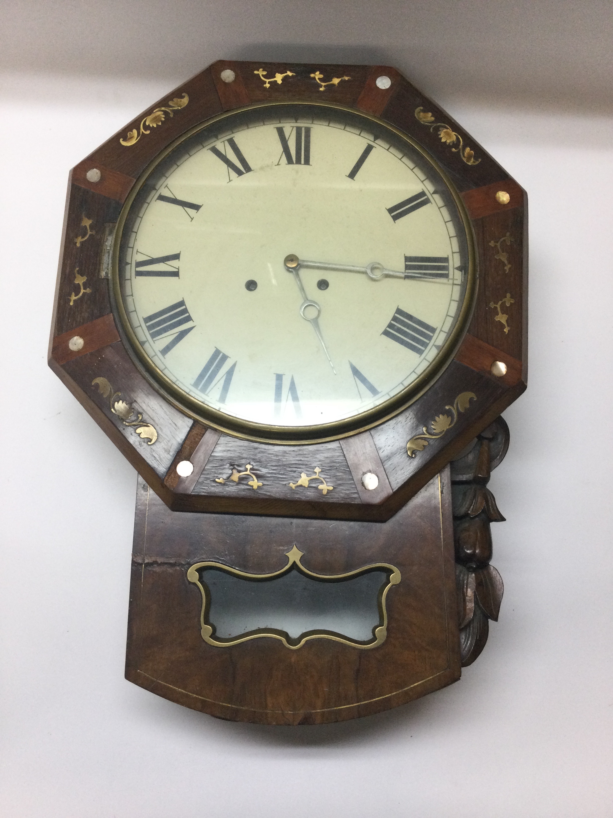 An antique 19th century mahogany/rosewood drop dial wall clock