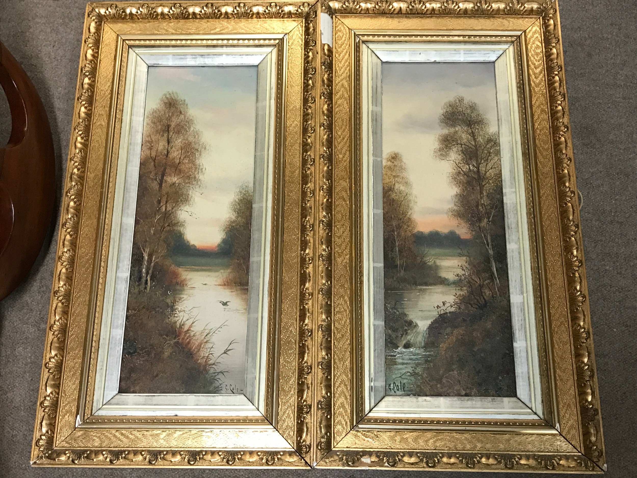 A pair of gilt framed oil painting rural views, signed G.Colr frames 75x39cm and pictures 18x55cm