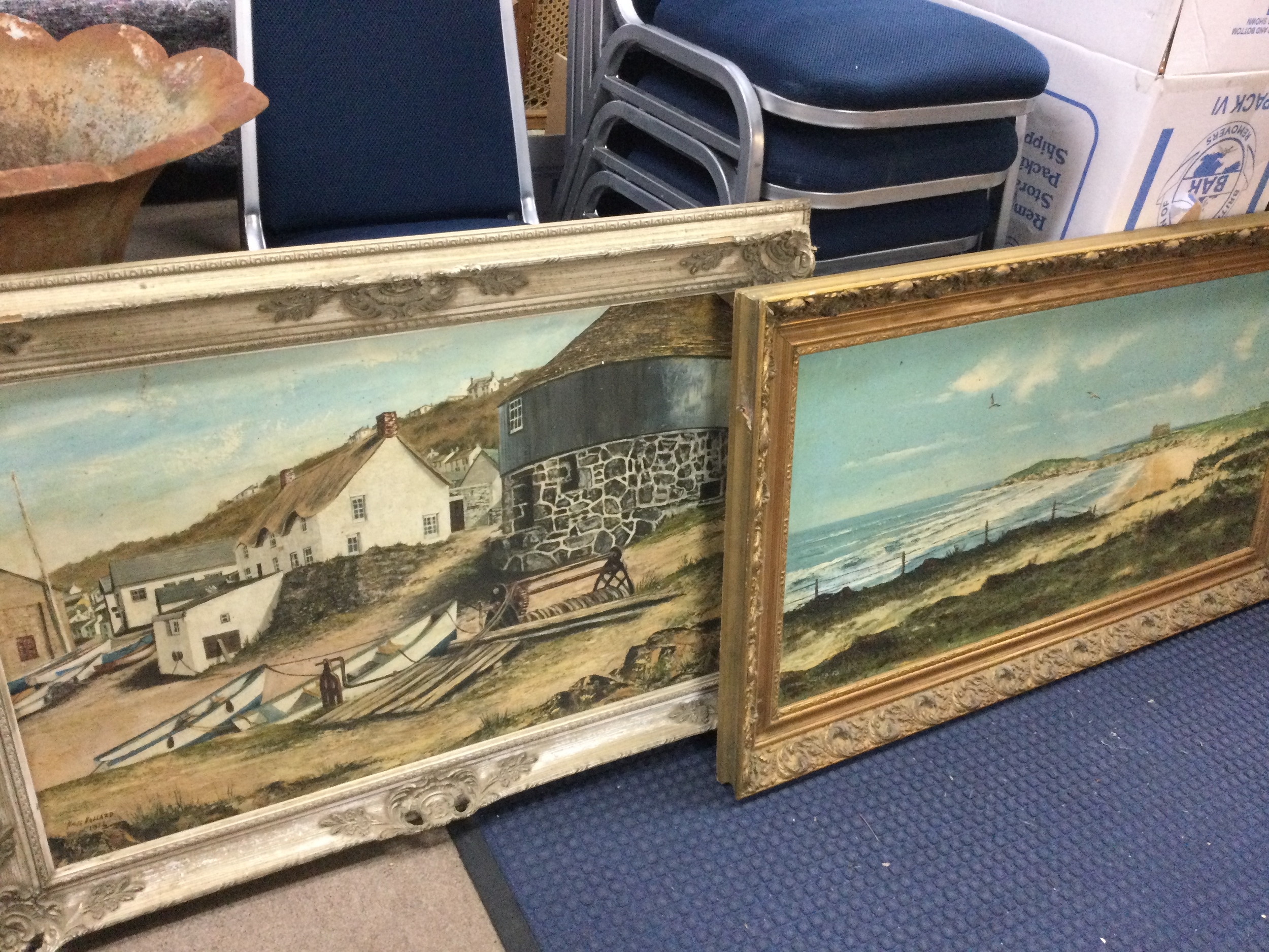 Two paintings fishing village by Nigel Hallard 1972 91x66cm and a coastal landscape painting frame 106x90cm