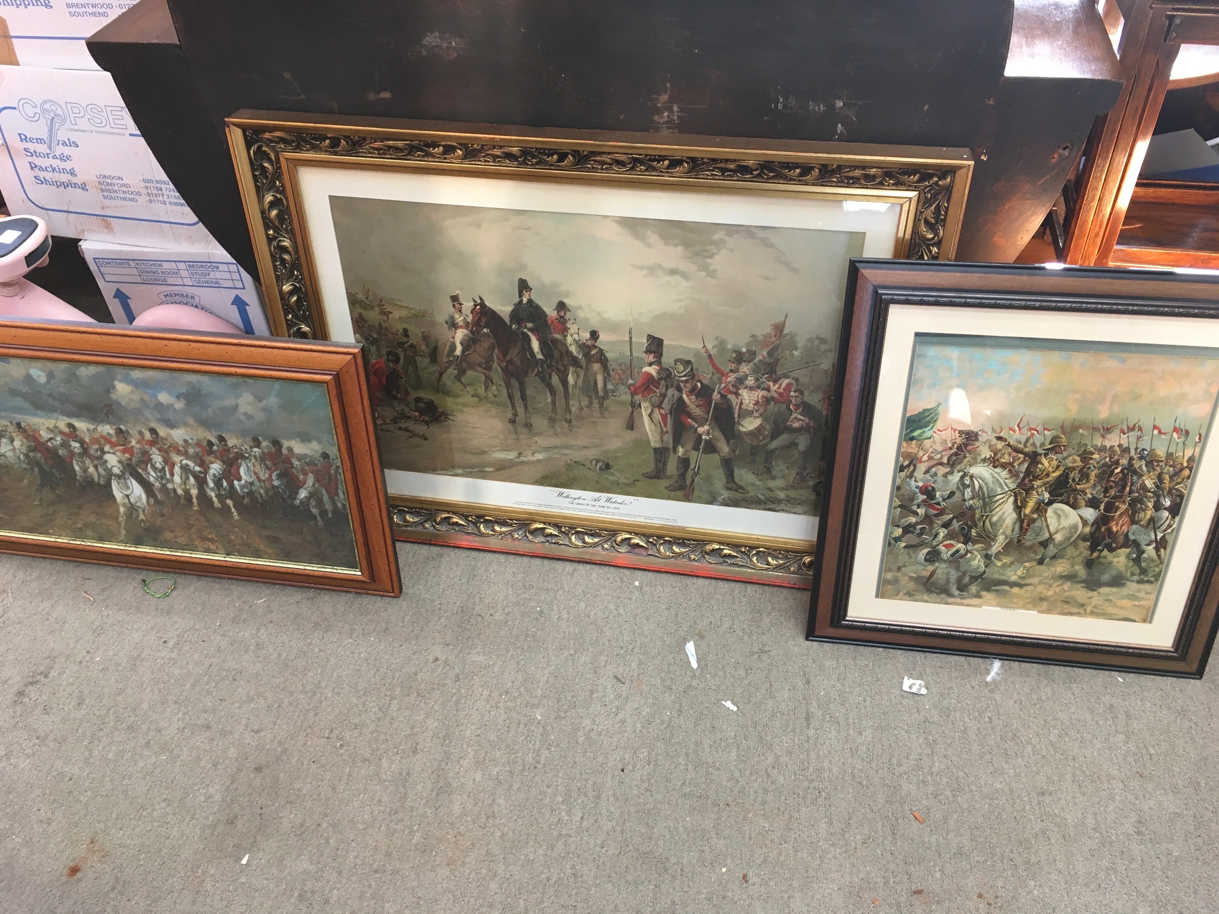 framed artwork coloured lithograph titled "Wellington at Waterloo with two other framed pictures.