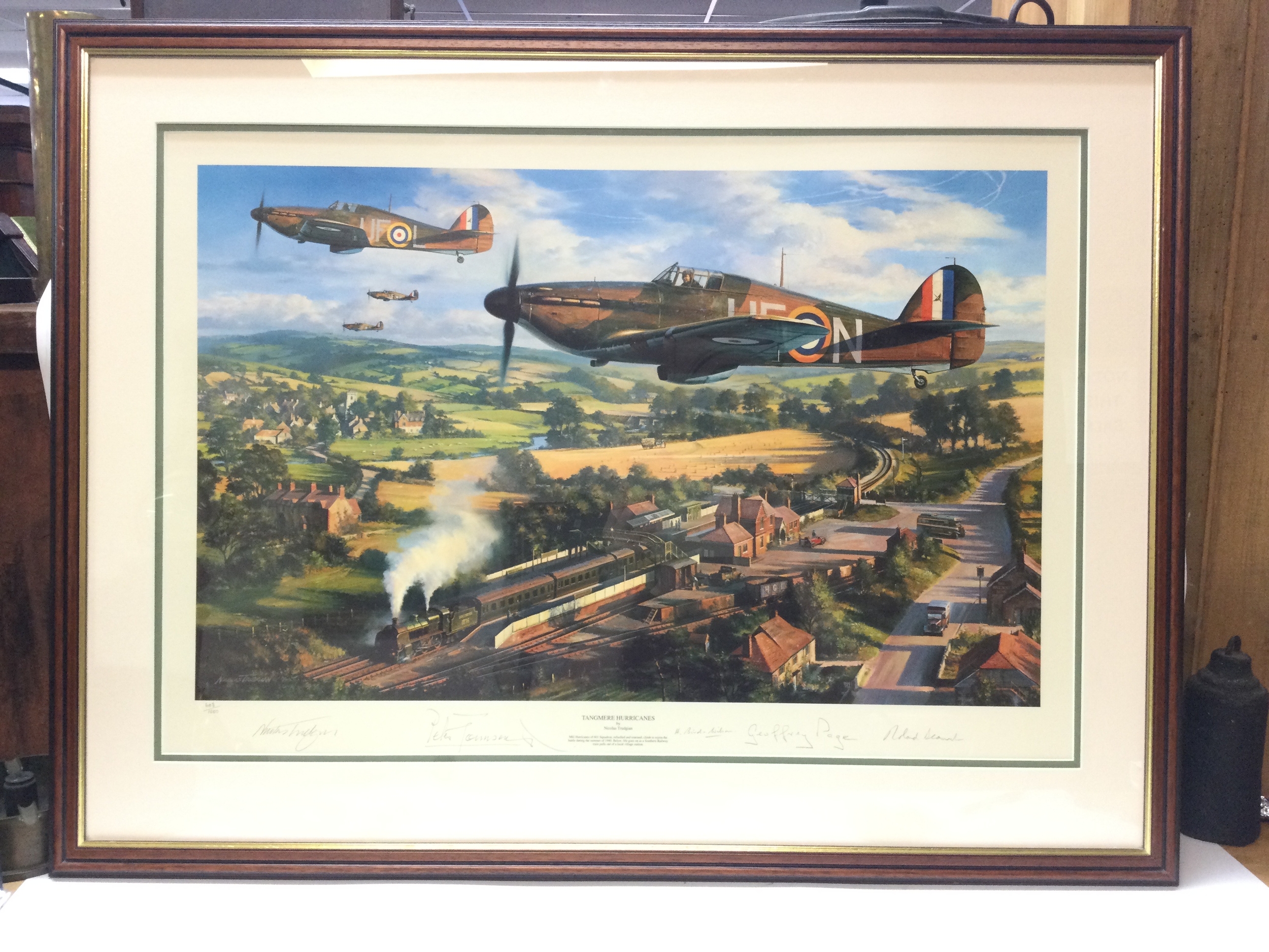 A print signed Tangmere Hurricanes by Nicolas Trudgian. 603/1000. Height 28cm, Width 36cm. 