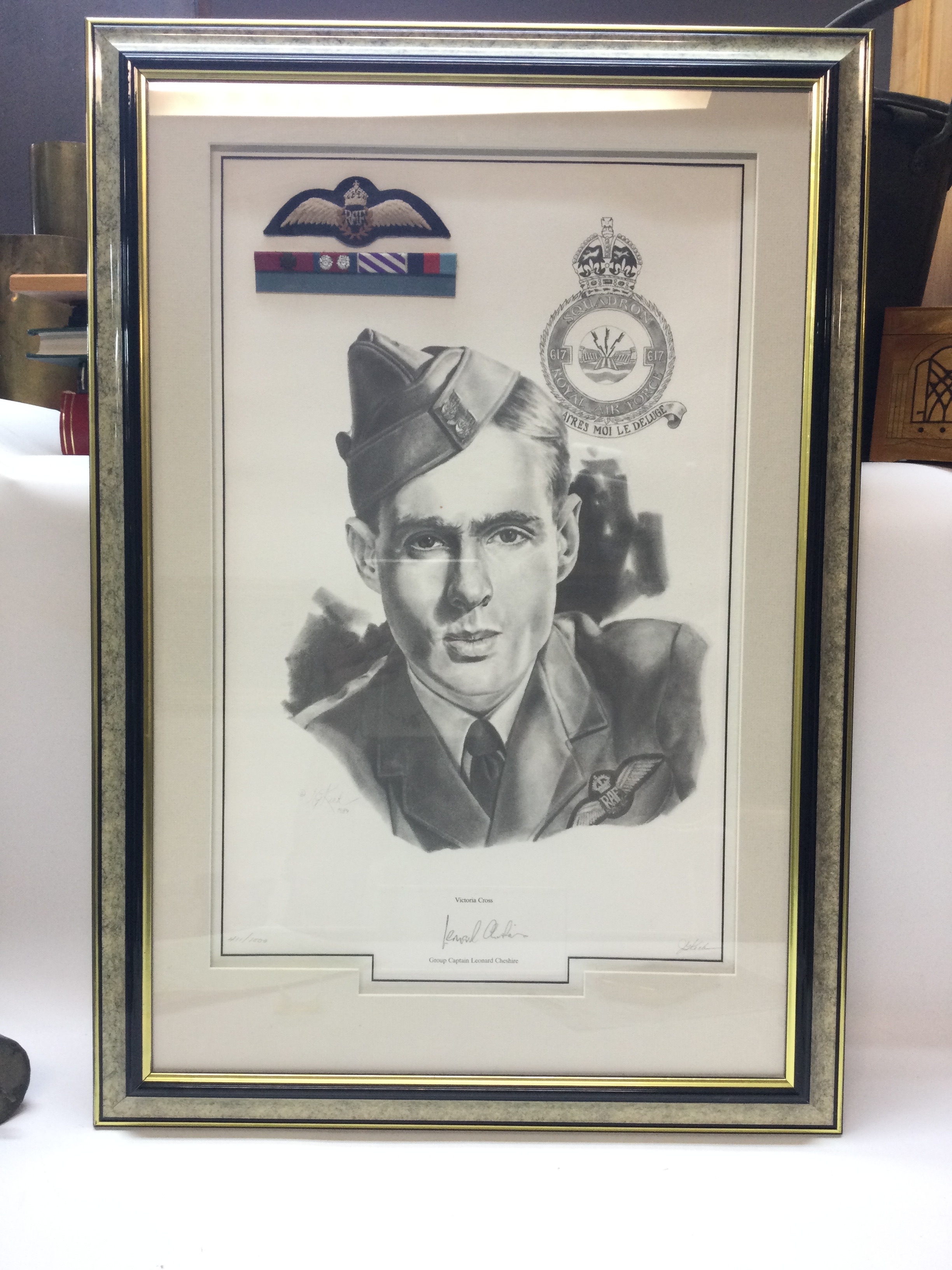 A commemorative display dedicated to Group Captain Leonard Cheshire by J.G. Keck 411/1000. Height 29cm, width 20.5cm. 
