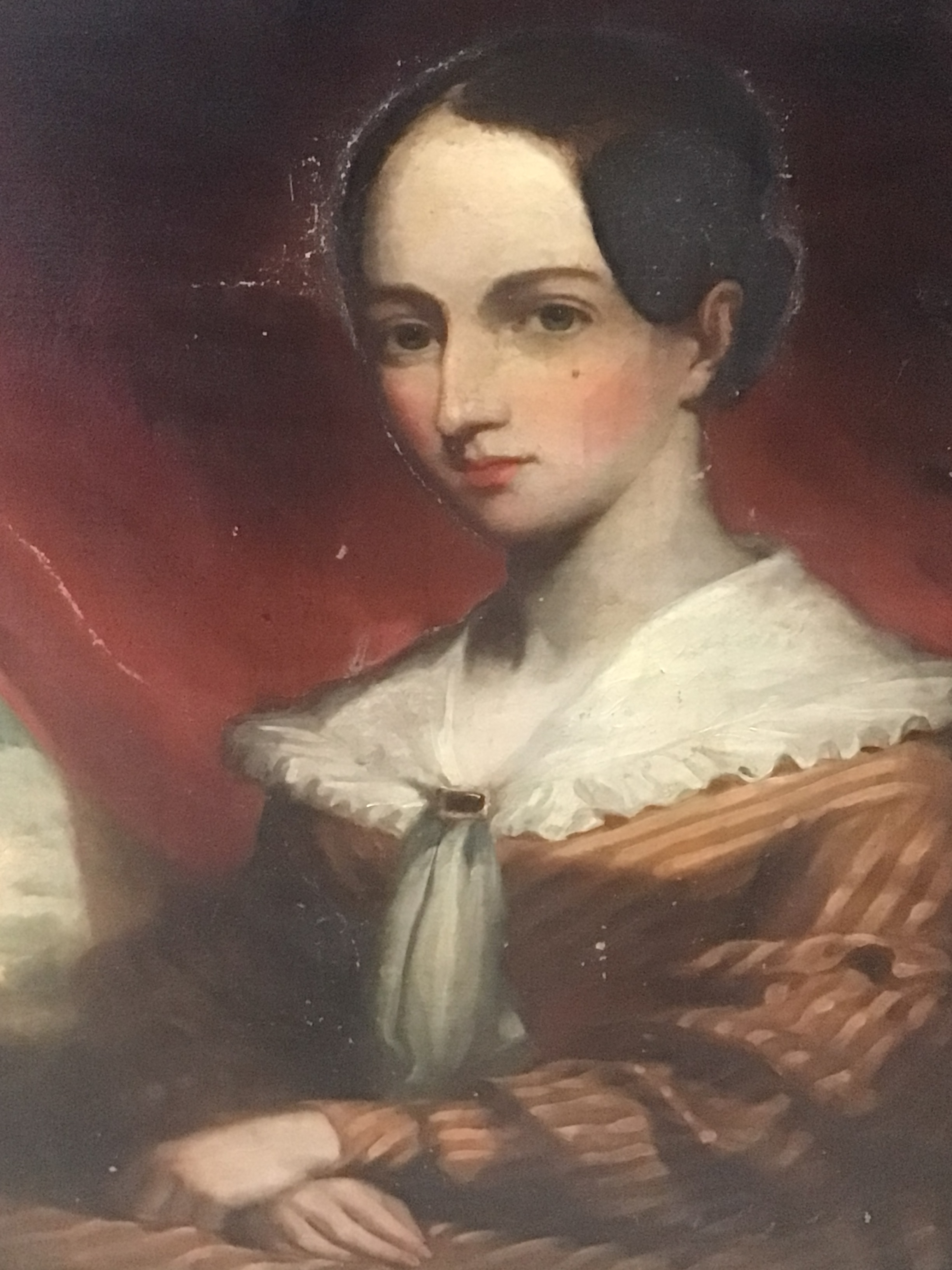  An Early Victorian oil painting portrait of a young lady seated half length in a gilt frame canvas possible re-lined unsigned and unattributed, 100x90cm 