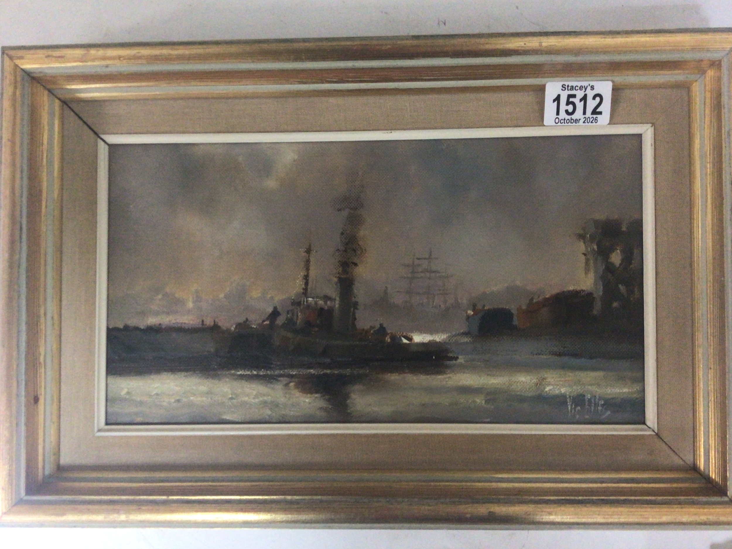 A framed oil painting on canvas by Vic Ellis R.S.M.A The painting entitled Above Greenwich.  with two tug boats and barges by a Key. A nice example of Vic Ellis work. Reverse with label. 45x30cm 