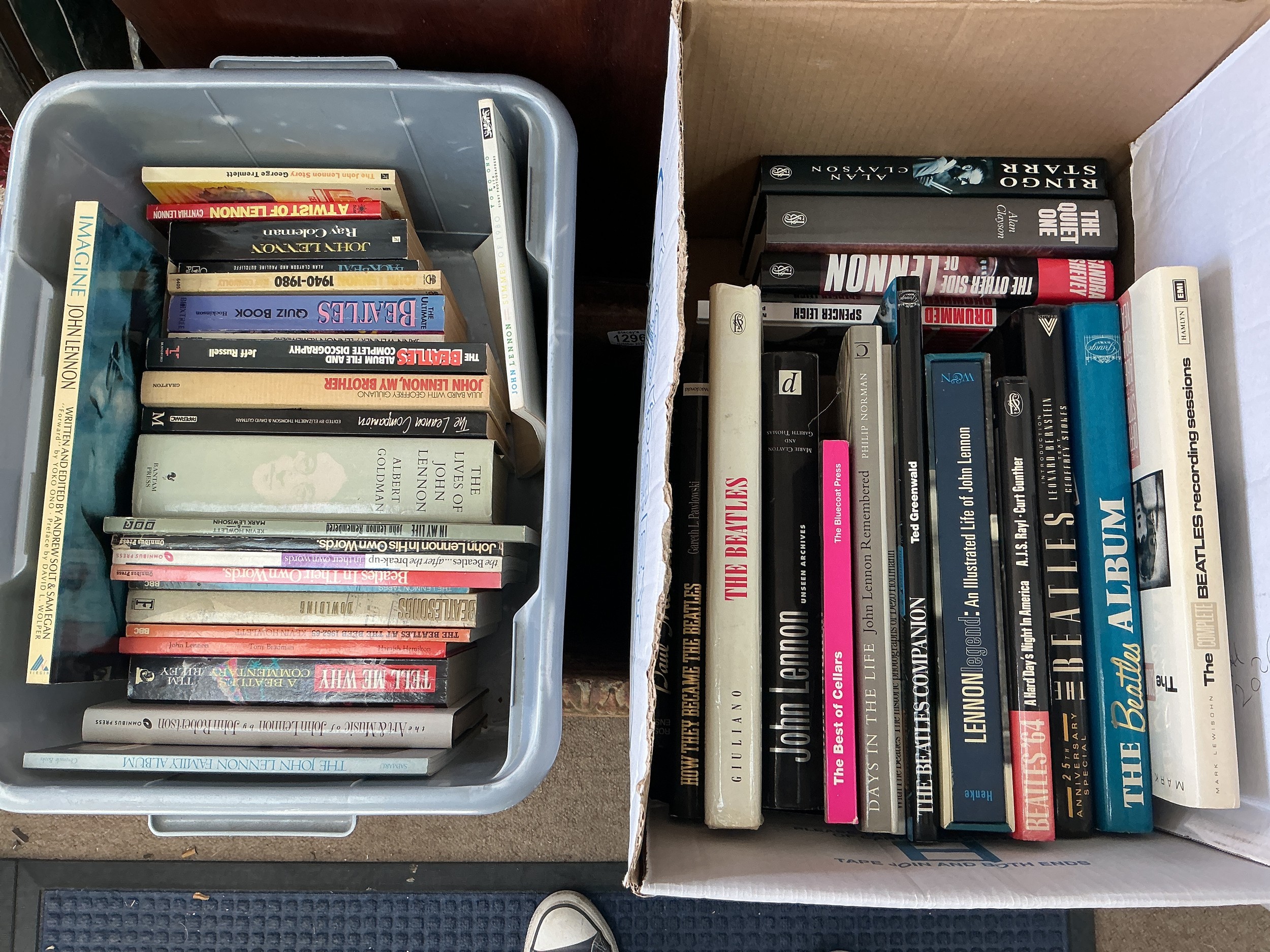 Two boxes of books on The Beatles comprising A Twist Of Lennon by Cynthia Lennon, The Complete Beatles Recording Sessions by Mark Lewisohn and others.