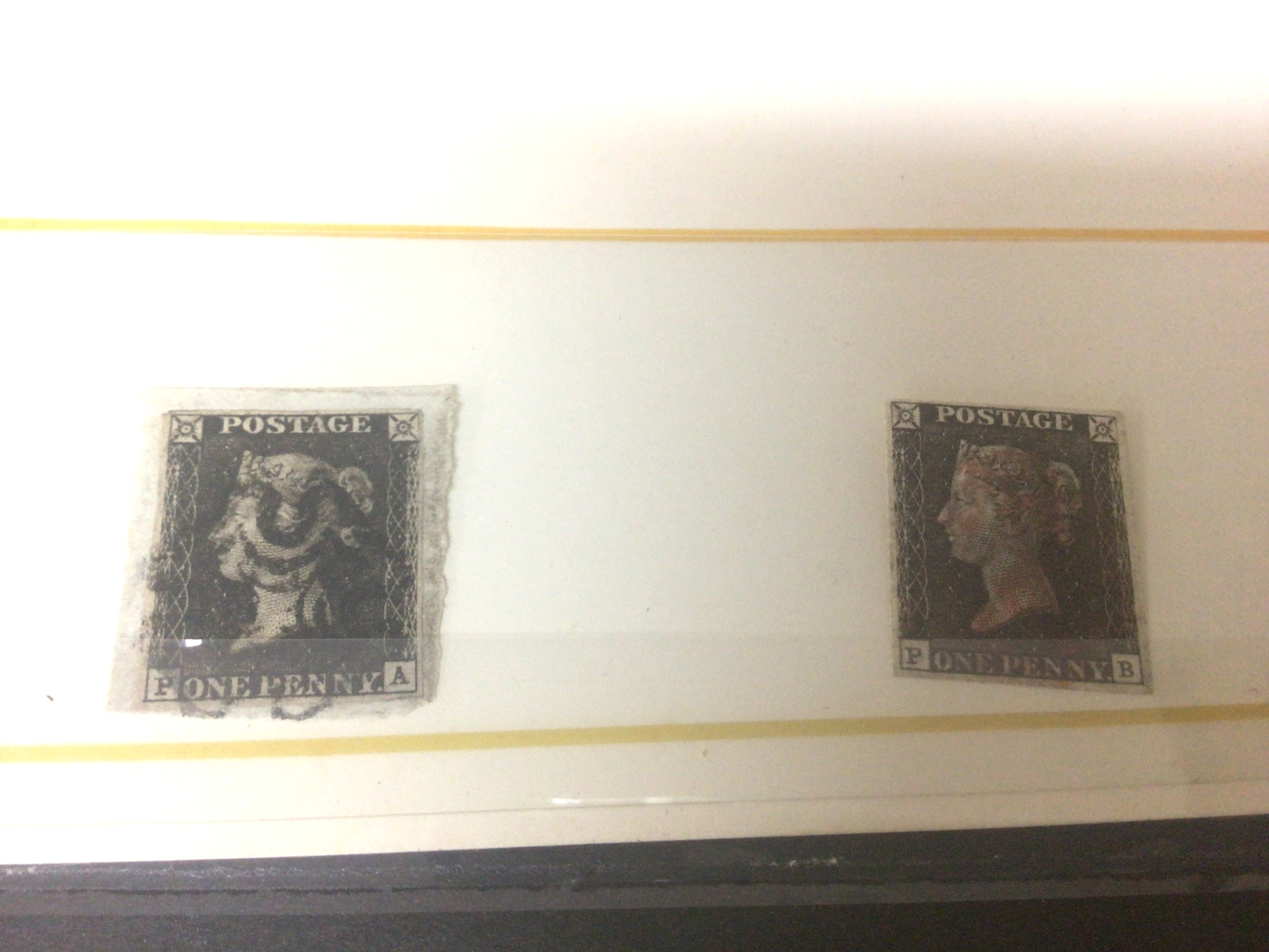 An album of stamps including two Victorian Penny blacks othwr Victorian stamps including an unused Gold Coast Victorian Specimen part set and many other stamps.