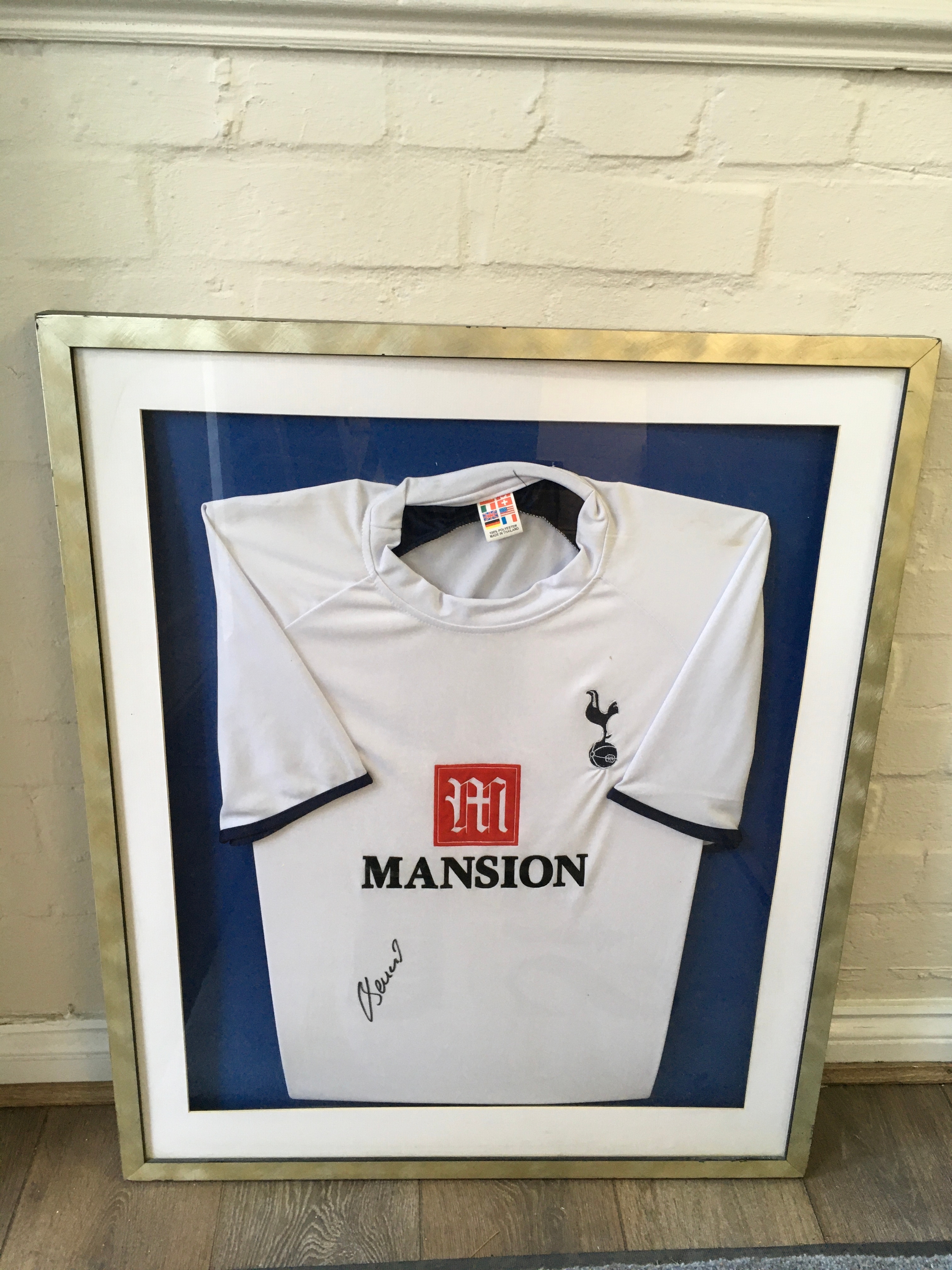 A framed signed Tottenham Hotspurs football shirt. Approx W67 x H82cm