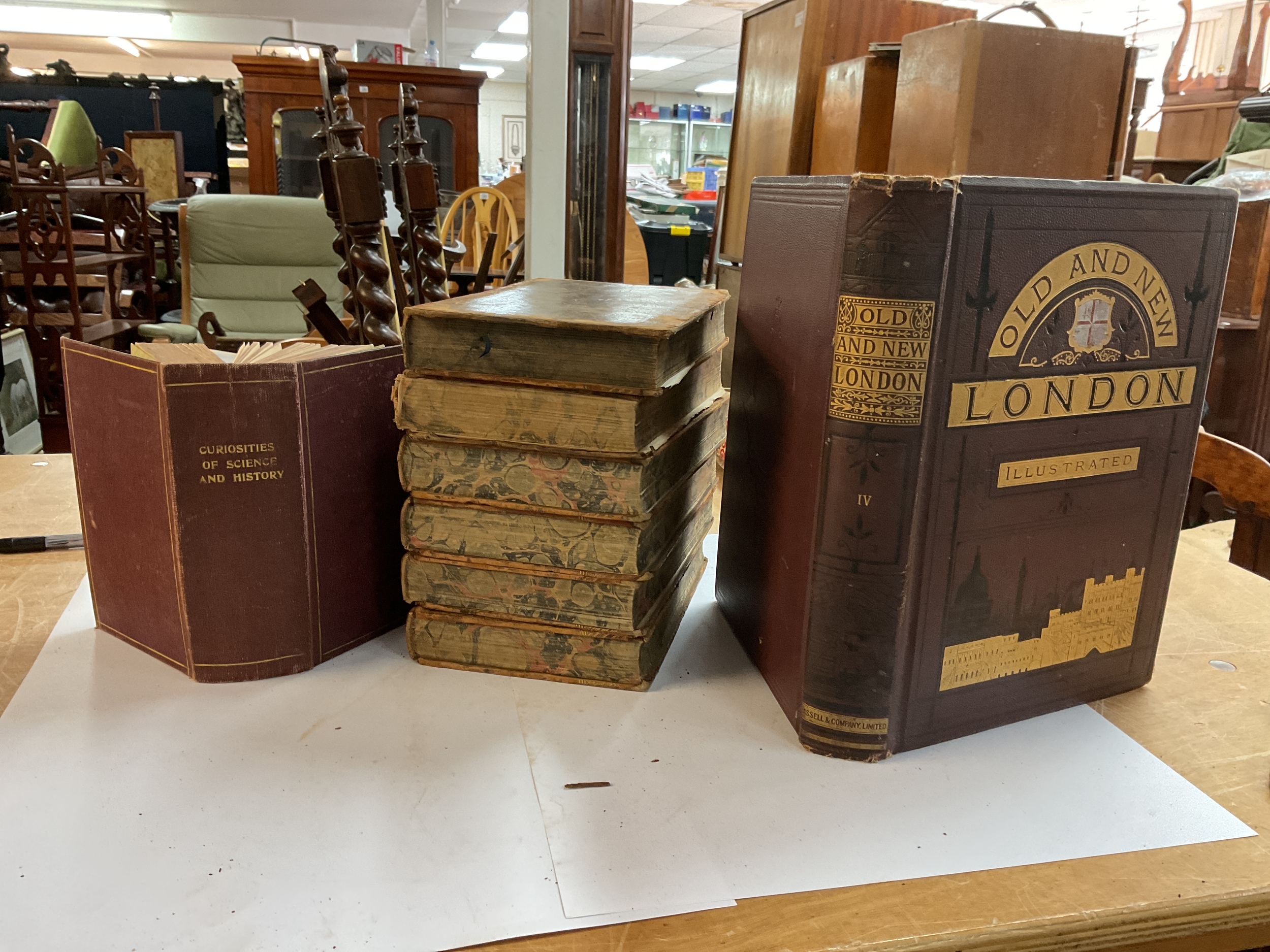 Two leather bound sets of The History of England, 1811 and 1813; one of which has the library paper for Major Sandham , Waterloo Artillery, along with two other books.