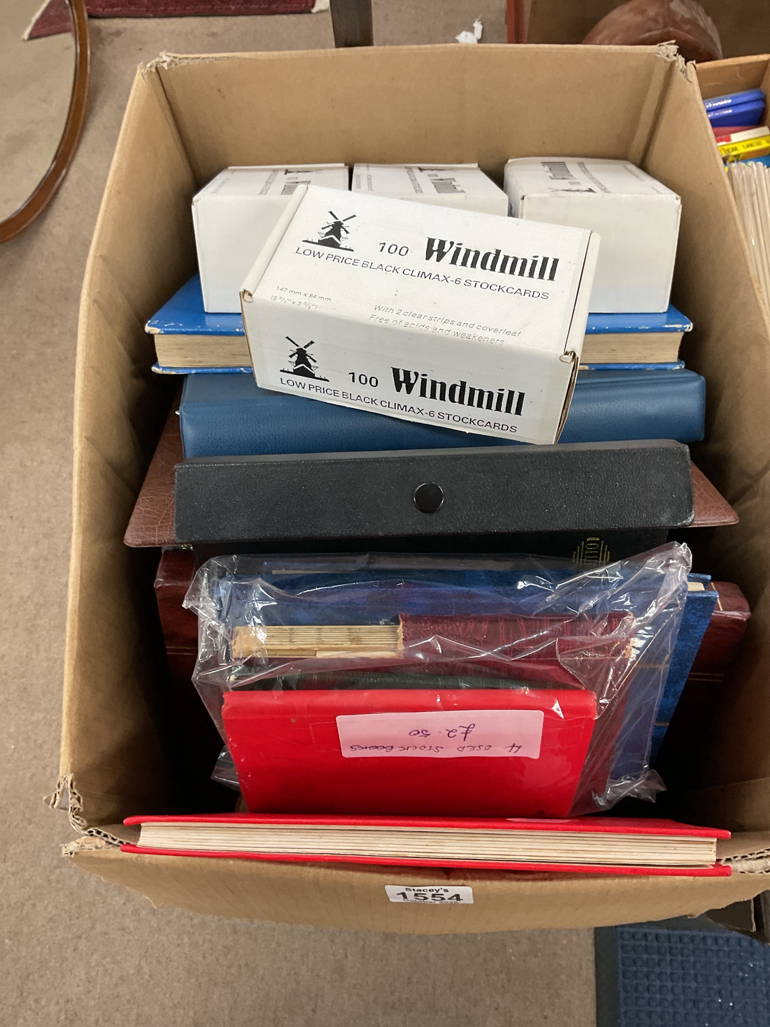 Empty stamp stock books and windmill stock cards etc.
