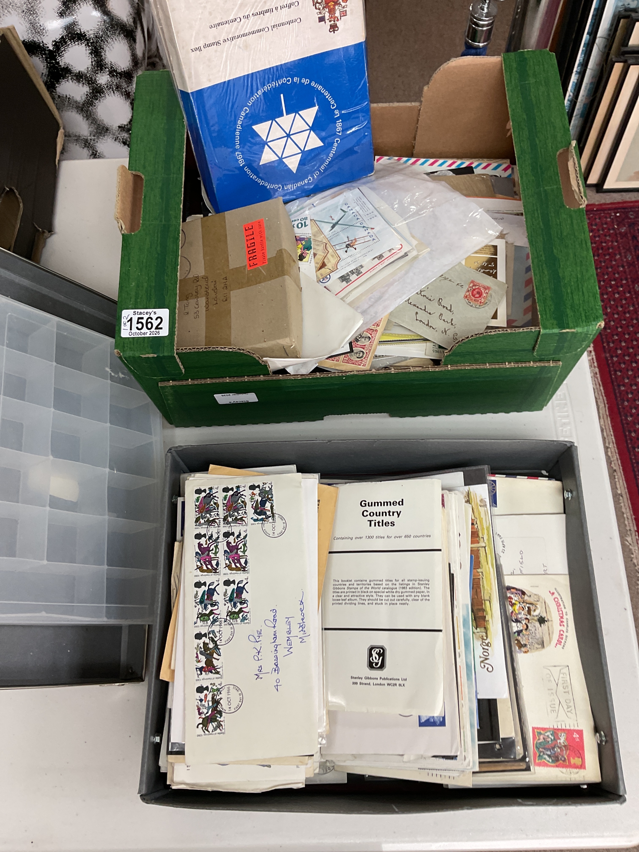 Two boxes of stamps to inc, packets, part albums, FDCs and mint.