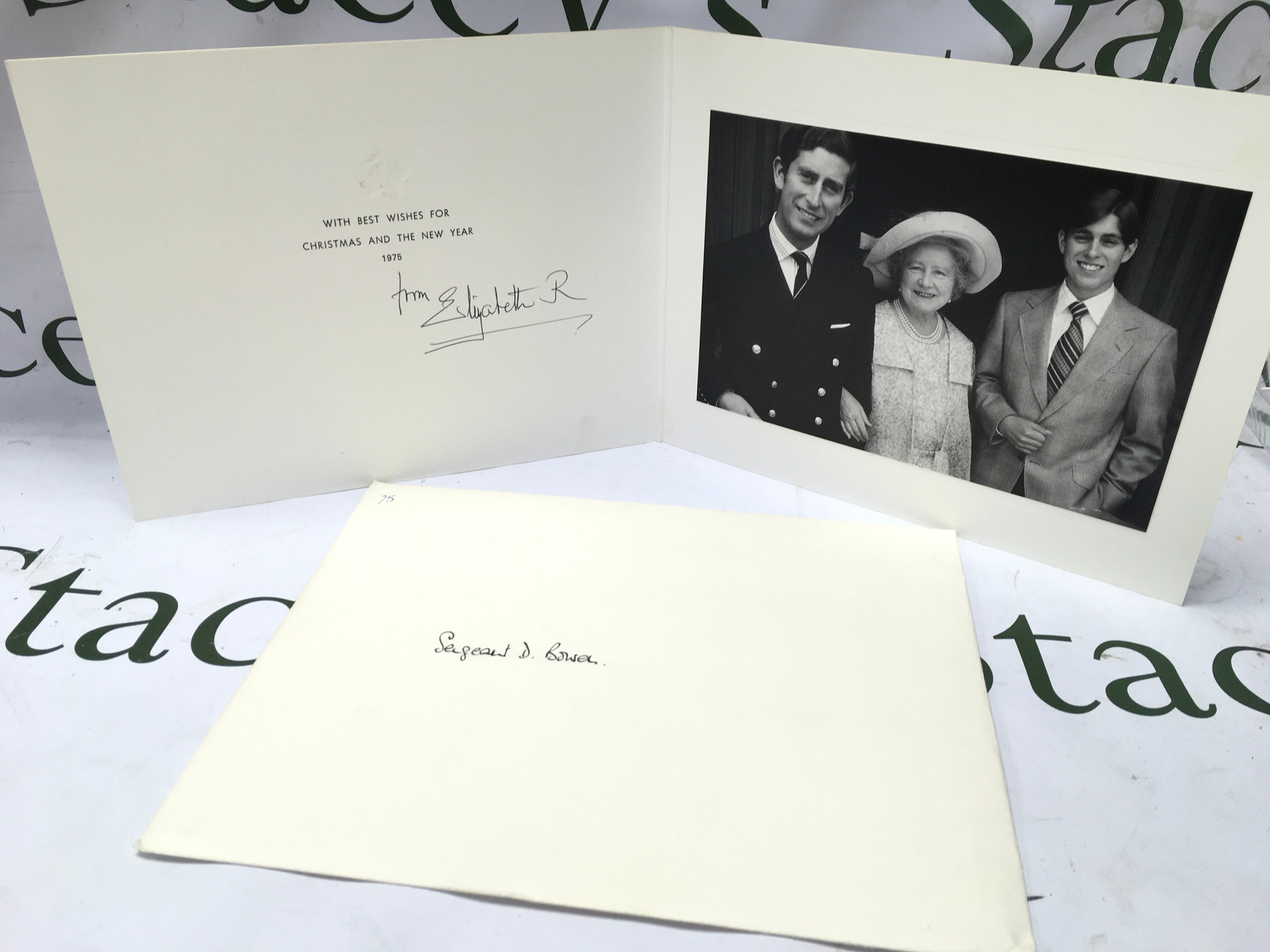 H.M. Queen Elizabeth (1900-2002) signed [autopen] Christmas card 1975, with black and white photograph of Her Majesty with HRH The Prince of Wales [Charles III] and Prince Andrew signed in black both 'from Elizabeth R', 235mm x 186mm and with envelope [hand delivered at Clarence House], overall condition good. Provenance: Sgt Daniel Owen Bowen RVM, Welsh Guards 1944-1968; member of Royal Household Clarence House 1968-1986, thence by descent.