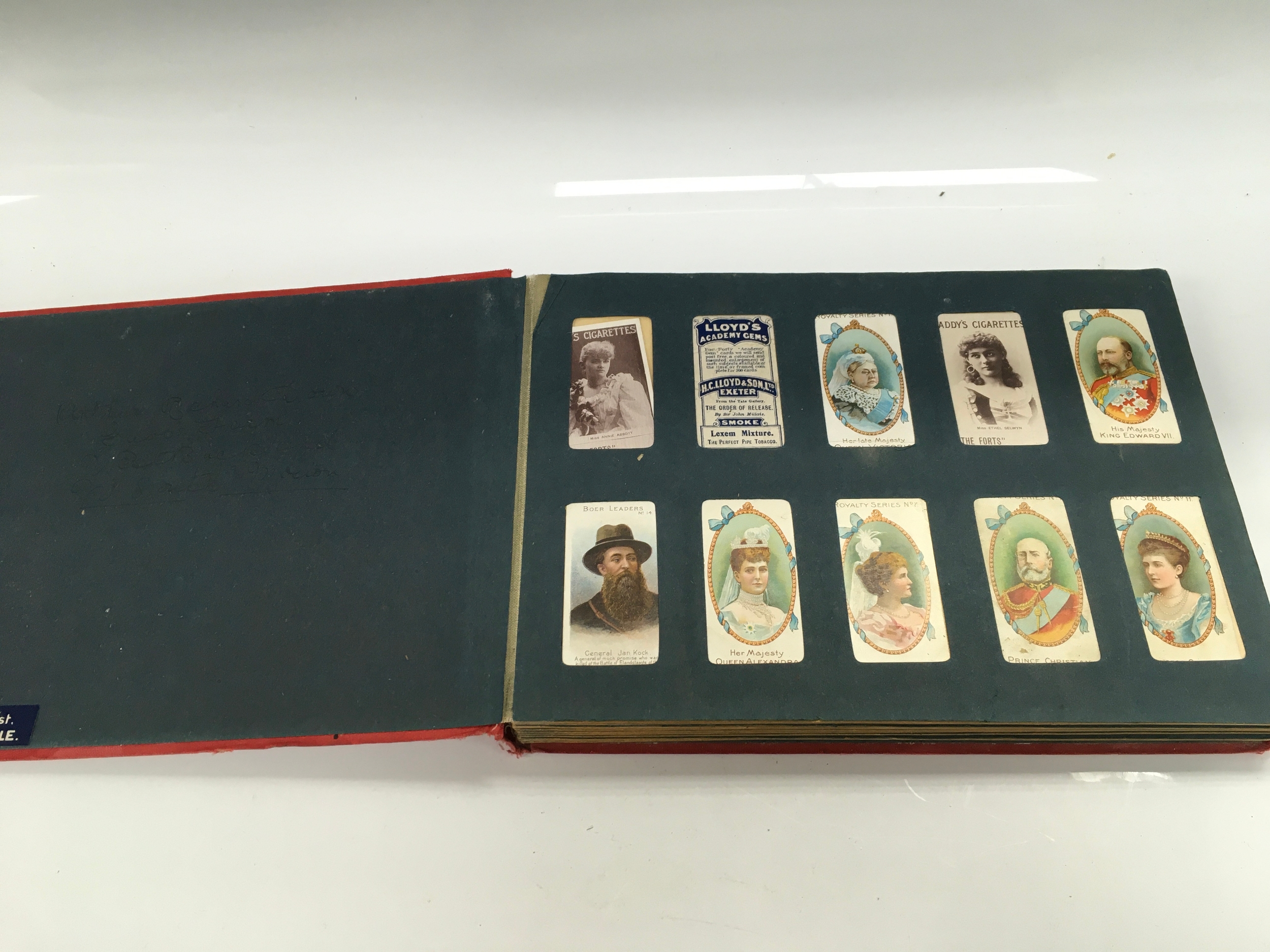 An antique cigarette cards in album.