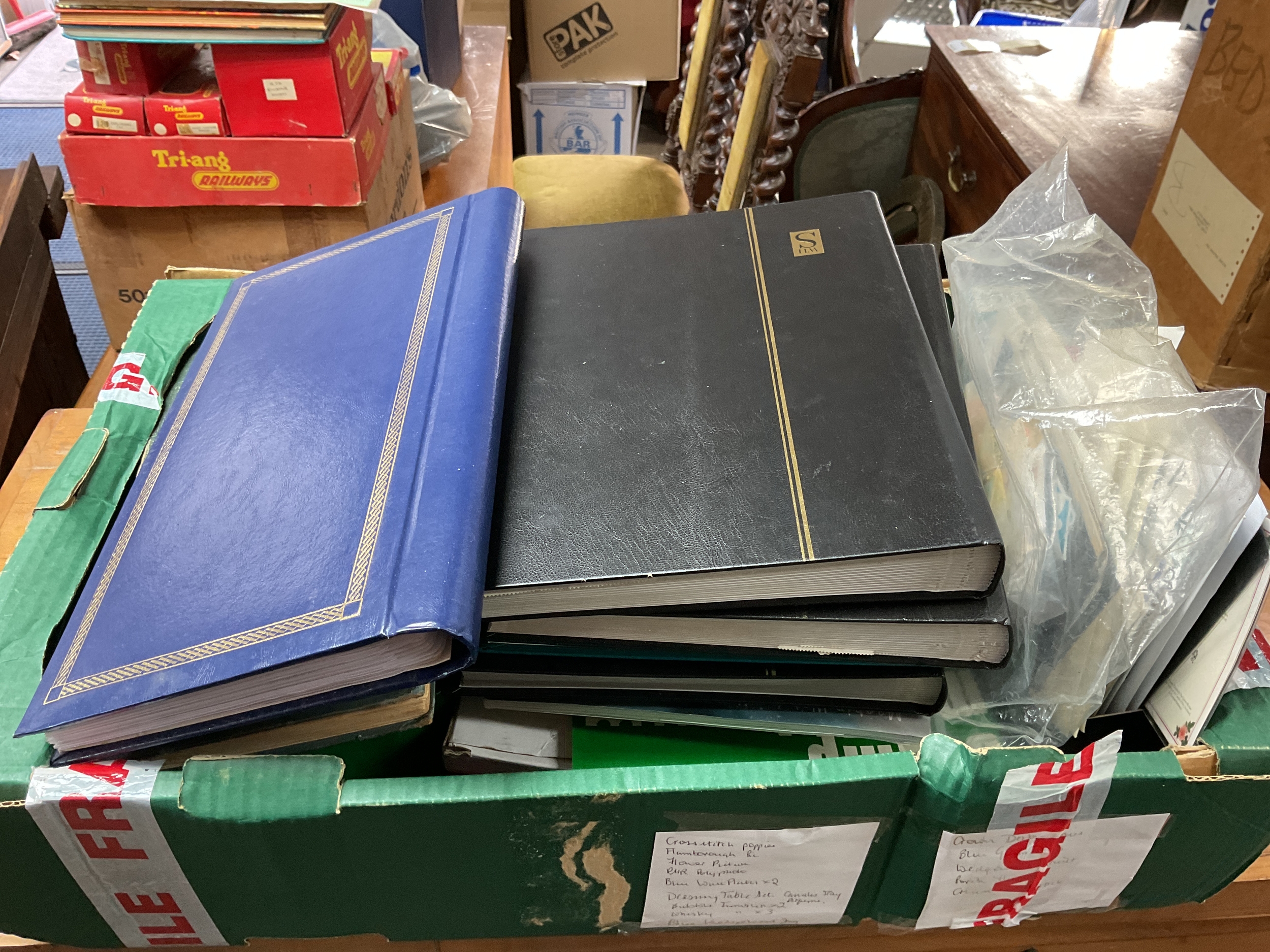 Box of mixed world stamps, albums, stock albums, packets etc.