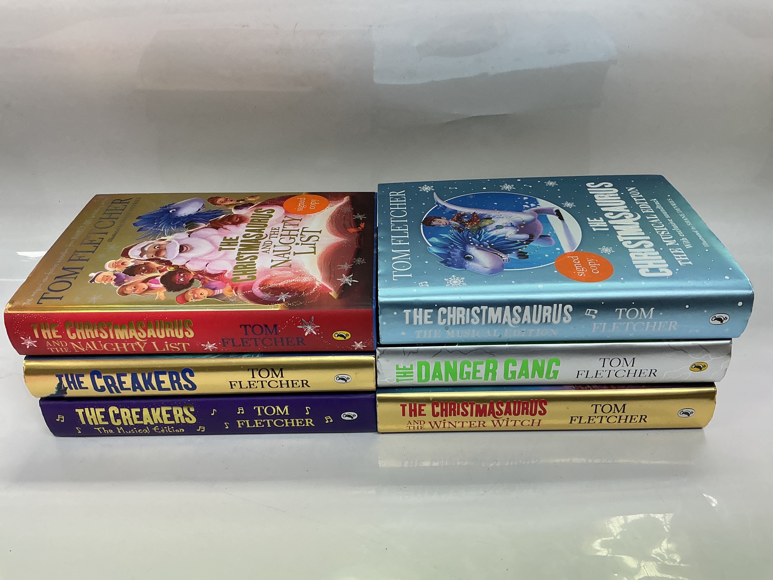 Six signed hardback books by Tom Fletcher of McFly.