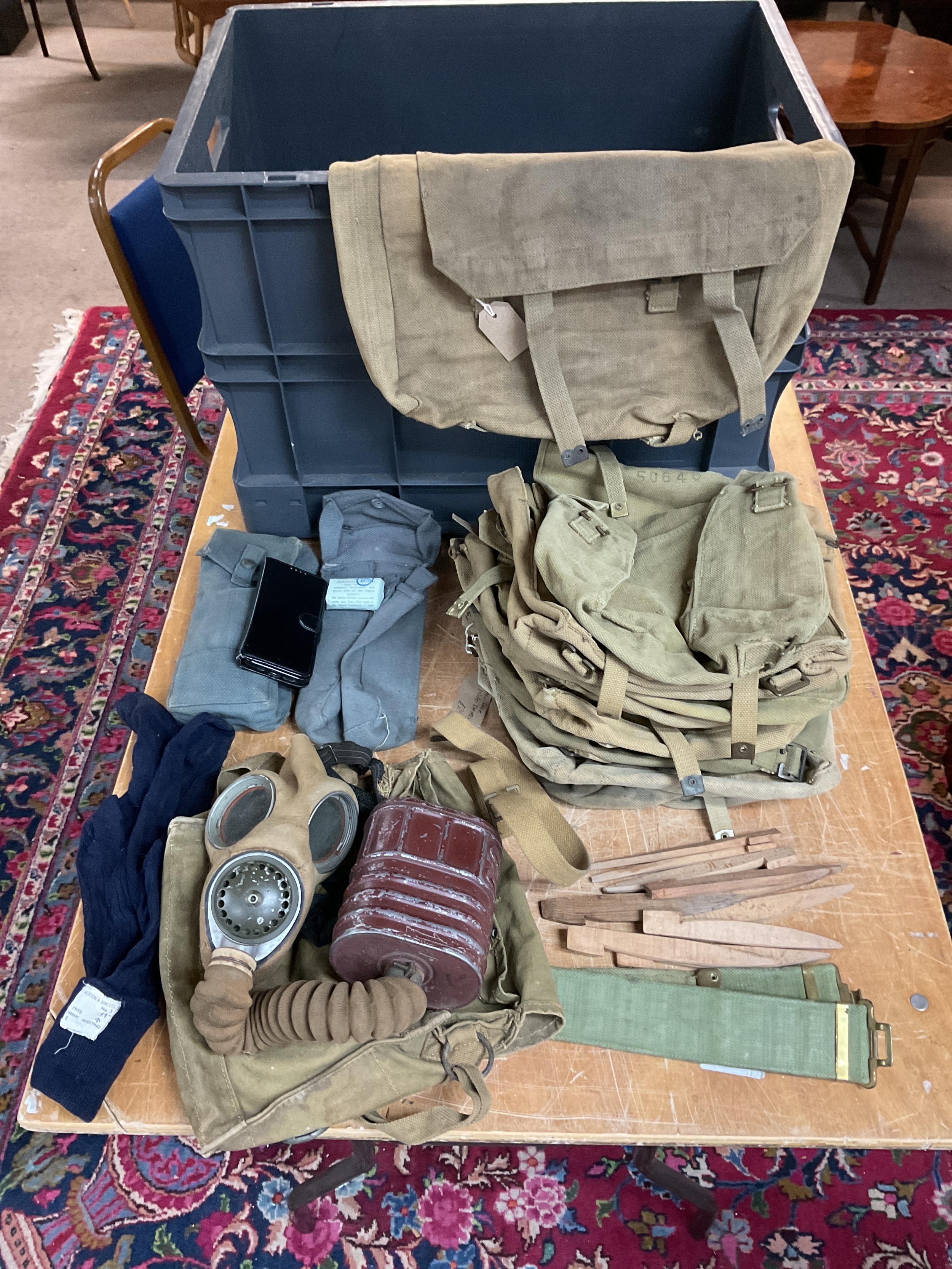 Qty WWII Webbing to inc nine small packs, one large pack, gas mask and bag, RAF sten gun mag pouches, belt etc.