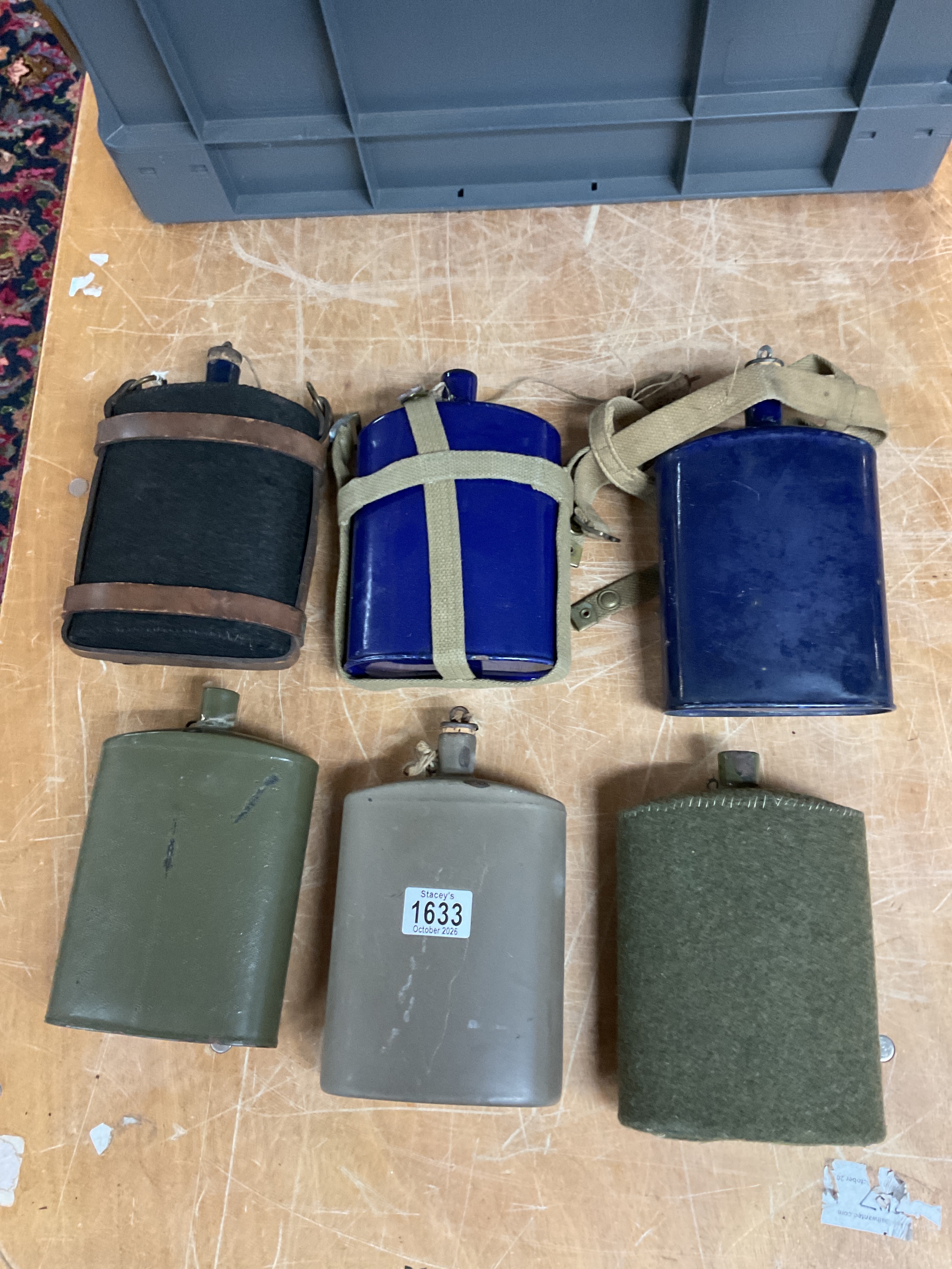 Six WWI water bottles.