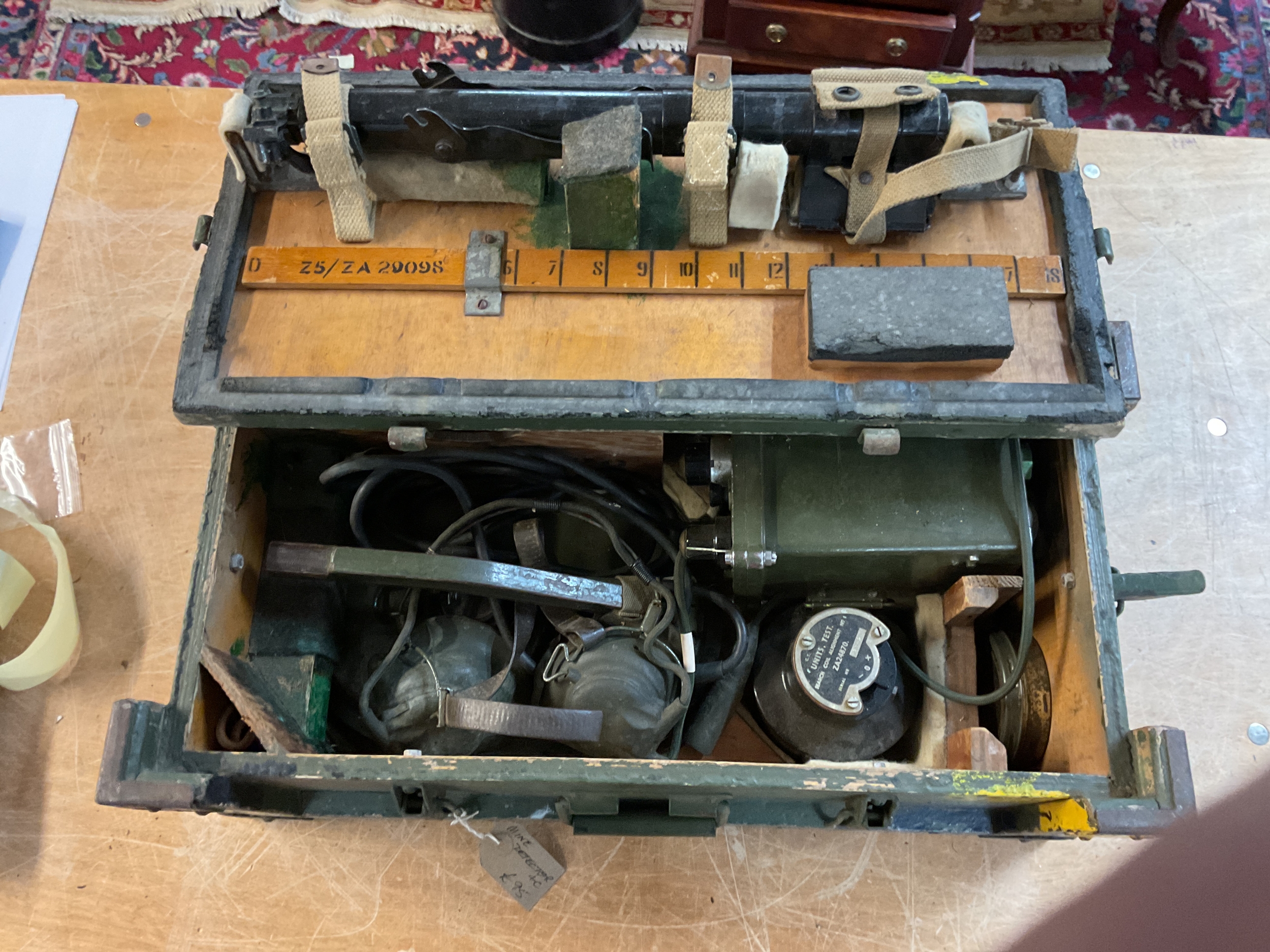 Boxed mine detector, complete.