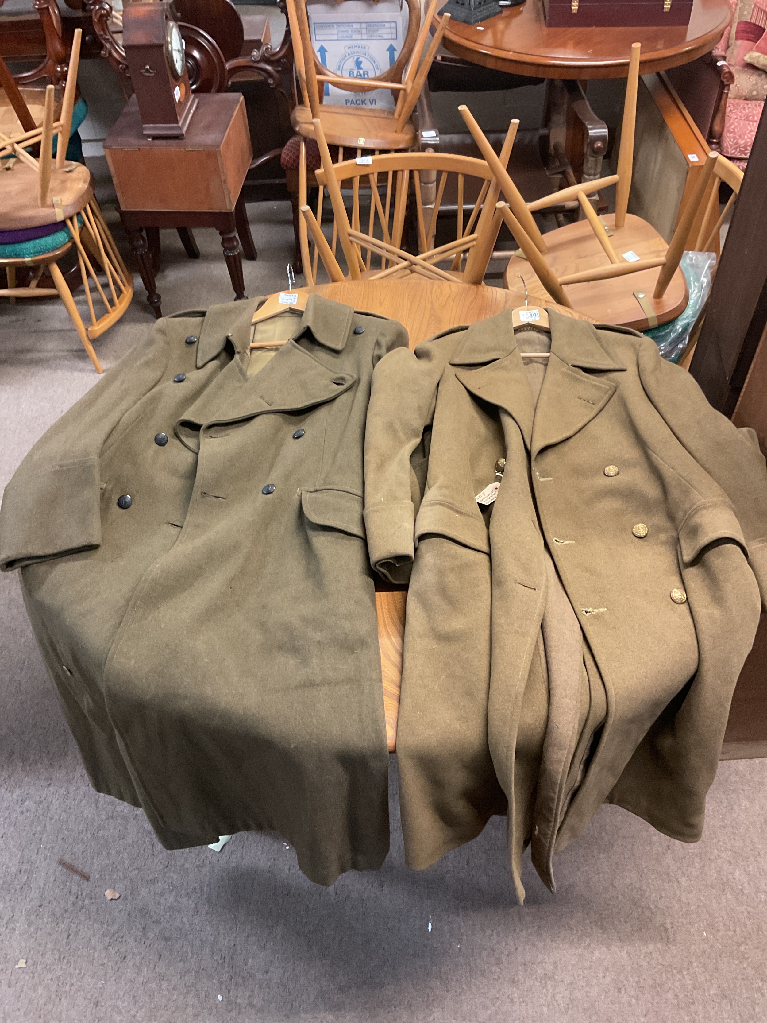 Two WWII era great coats, Royal Marine and Royal Ulster rifles.