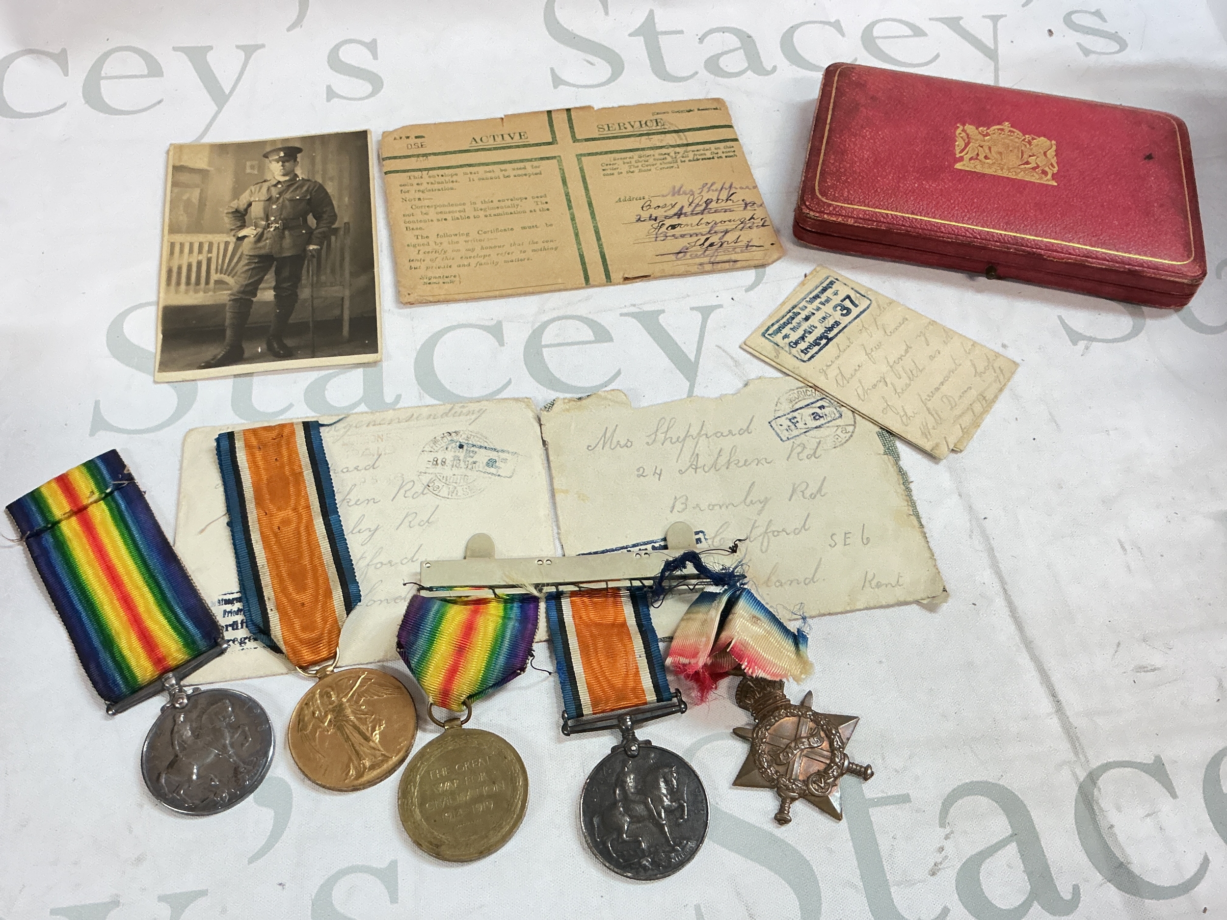 WW1 Trio medals presented to K13266. EW DUNSFORD STO I.RN & WW1 Pair to 4328 PTE B. SHEPPARD 22 LOND R , along with letters whilst a POW 