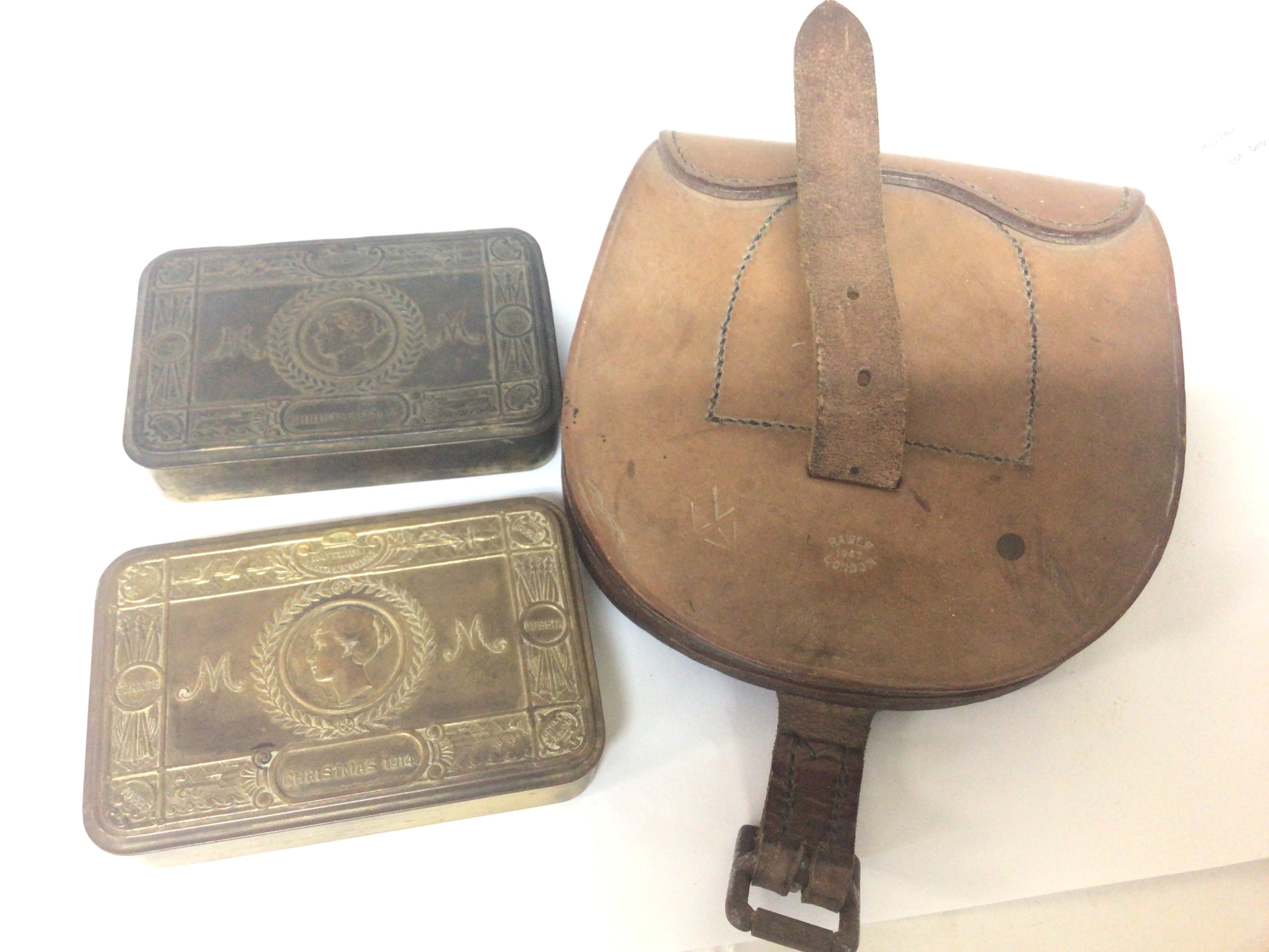  Two I world war Christmas tins and a military cavalry issue leather spare hose shoe pouch with both makers stamp and British Military stamp (3) 