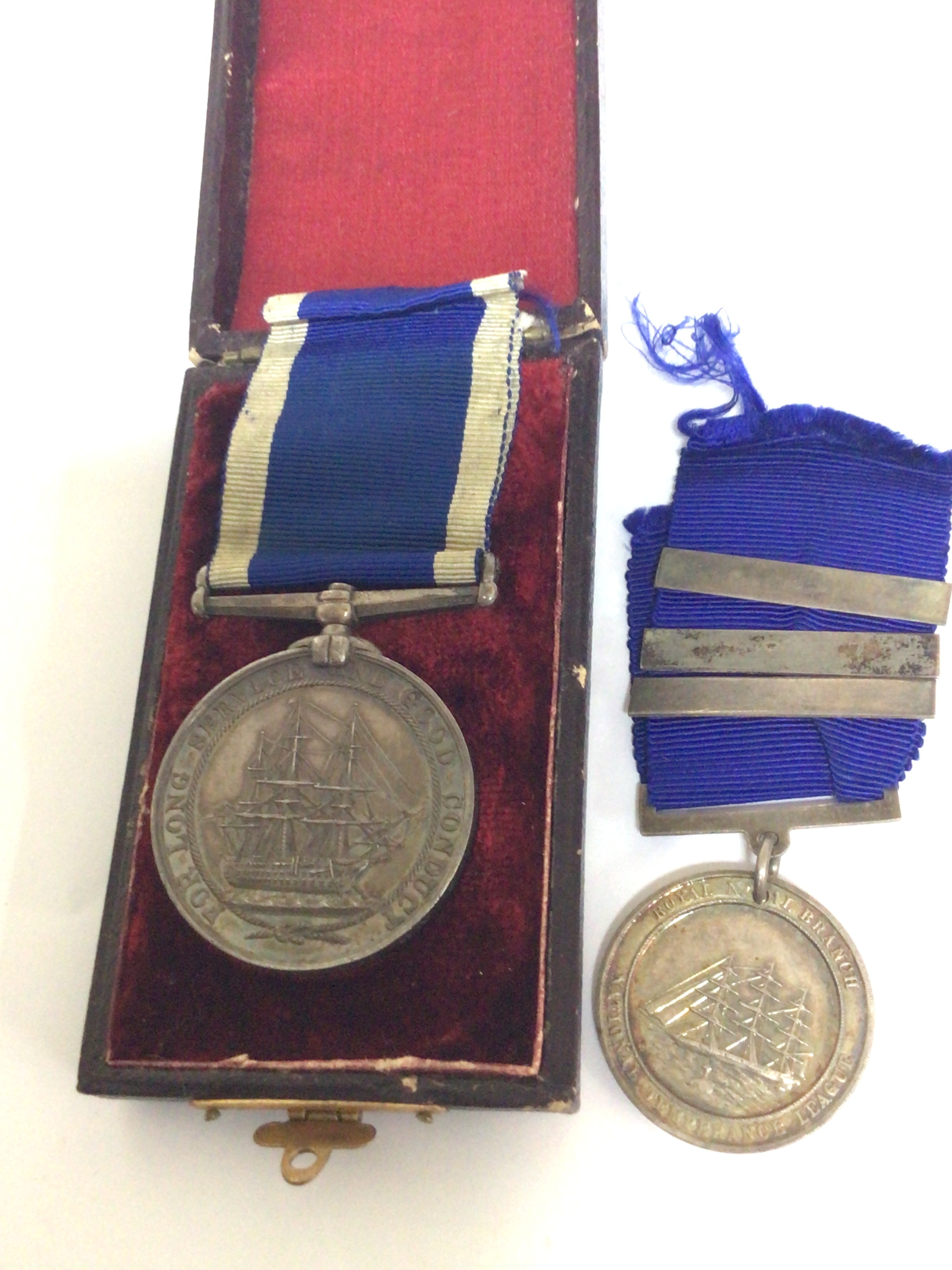  An exceptional Victorian medal for Long service and good conduct. Awarded to Henry W Holmes A.B Rigger H.M.Y Victoria & Albert in a velvet lined case the medal also accompanied with another smaller Royal Navy medal Temperance medal instituted on board HMS Reindeer. (2) : awarded whilst serving on Queen Victorias The Royal Yacht between 1855- 1899. 