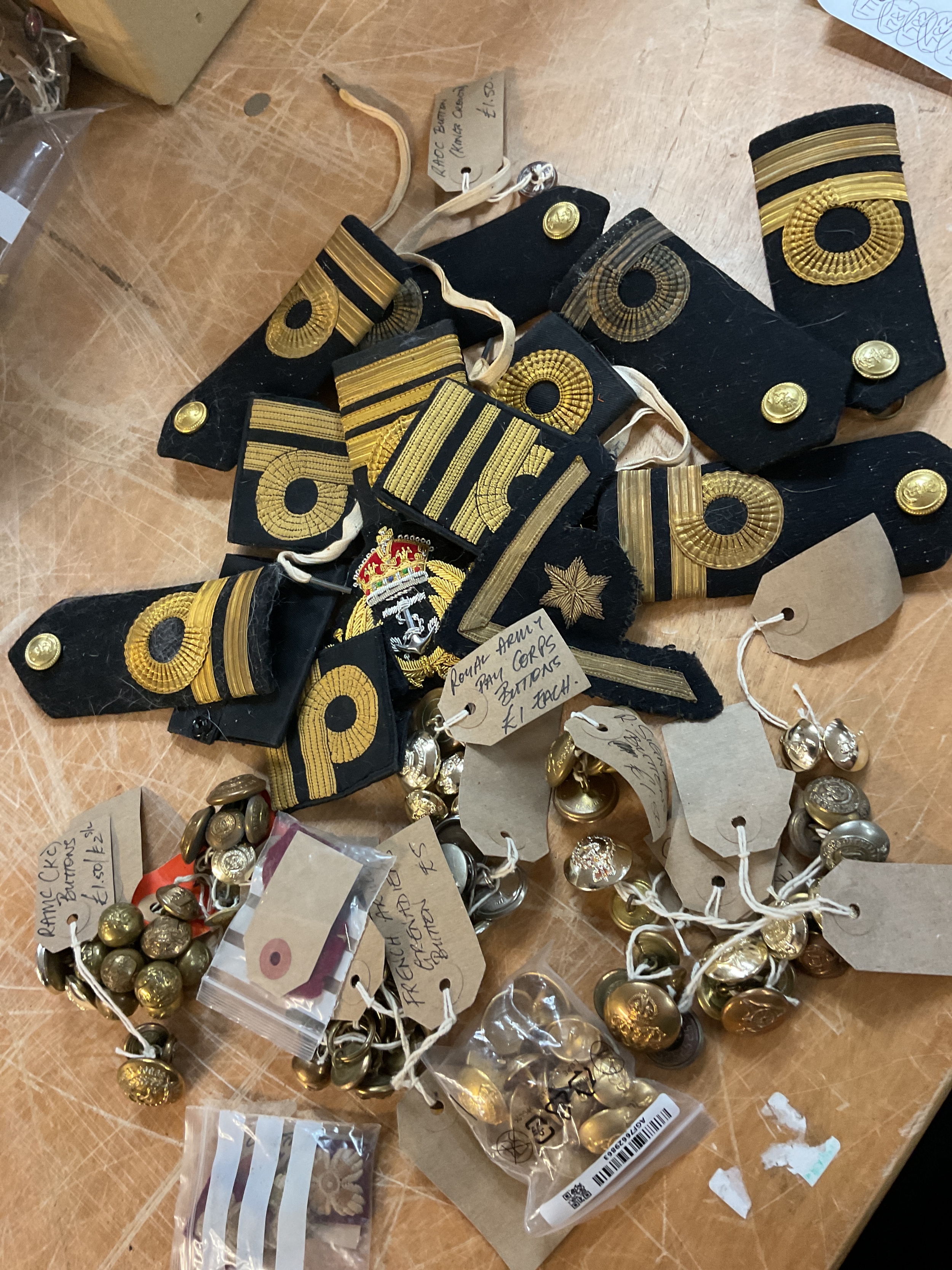 Qty WWII and later buttons along with Navy Epaulettes.