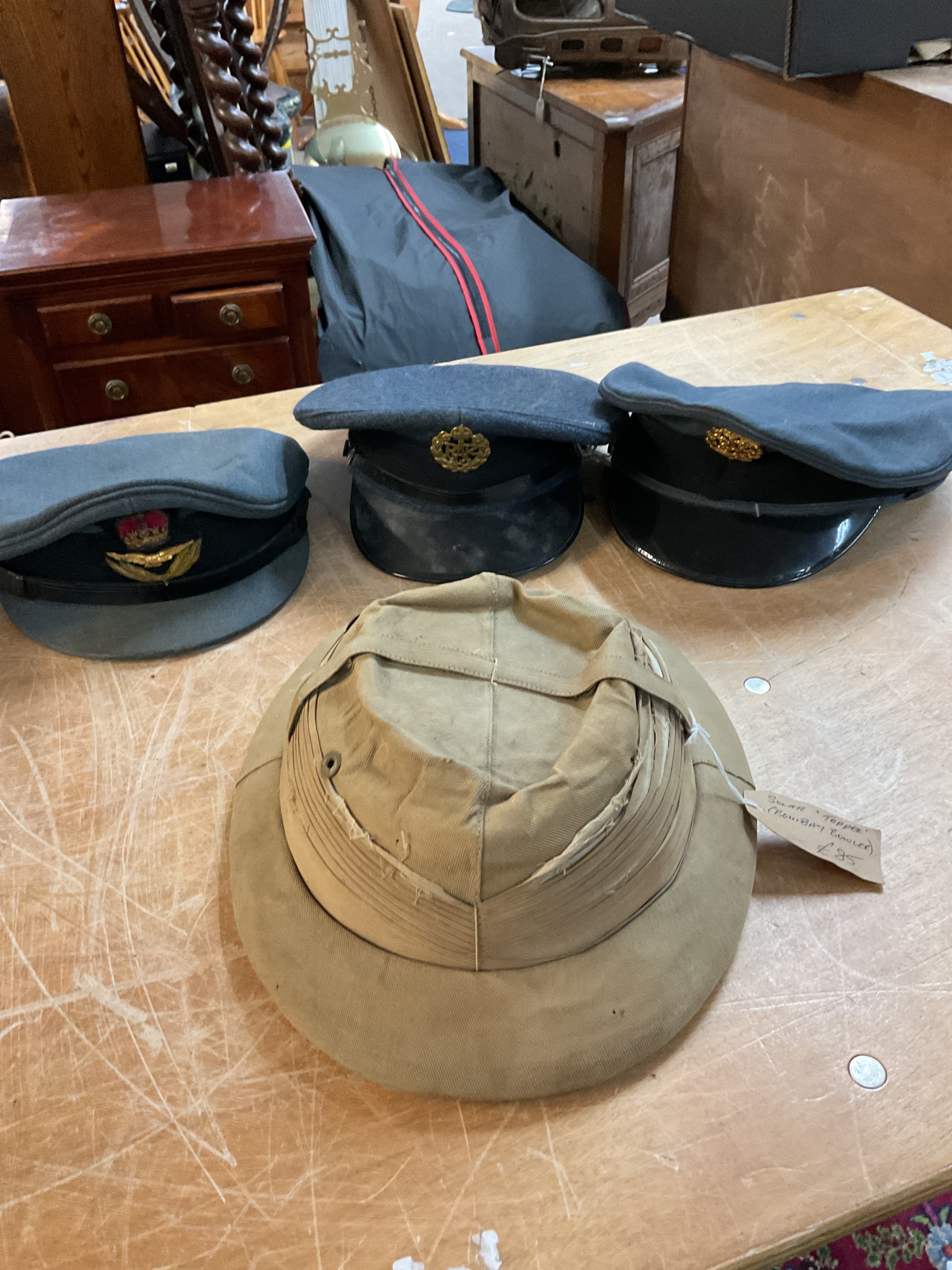 Three QEIIR RAF Officers caps and a solar Toppee.